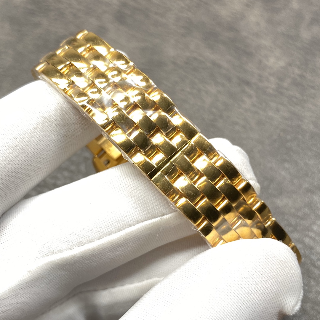 Cartier Panthère Collection Watch Dimensions: 27 x 37 millimetres. Available in white steel, yellow gold, or rose gold. The double-layered case presents a bold, three-dimensional silhouette with distinct layering. Edges are polished to a smooth, symmetric