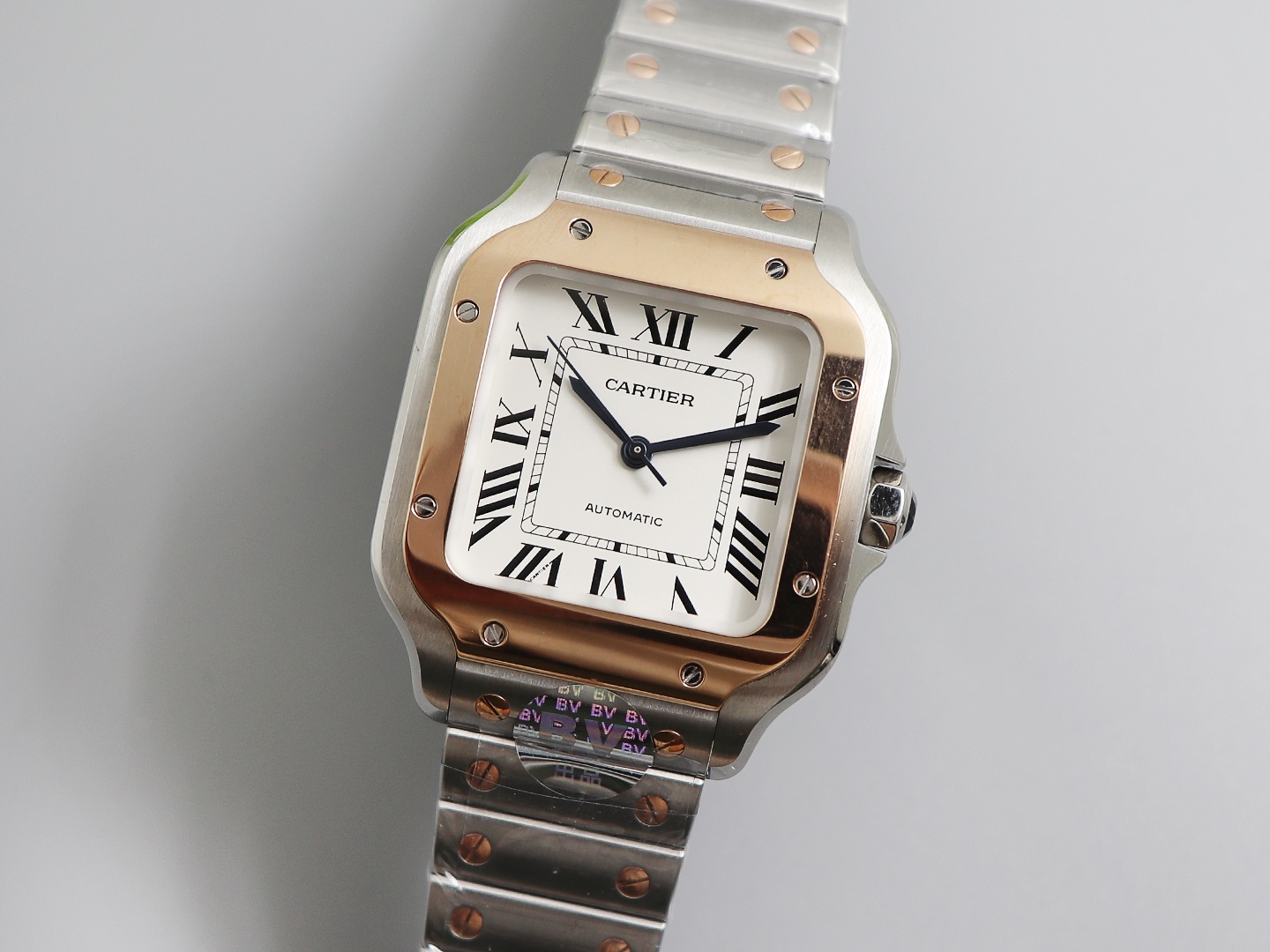 Ladies' Medium - Cartier New Santos Case: 316L stainless steel Dial: Gradient blue Hands: Swiss-crafted burnt steel blue Glass: Swiss anti-reflective coating/anti-scratch/anti-fingerprint AF treatment Strap: Features ergonomic SmartLink detachment system.