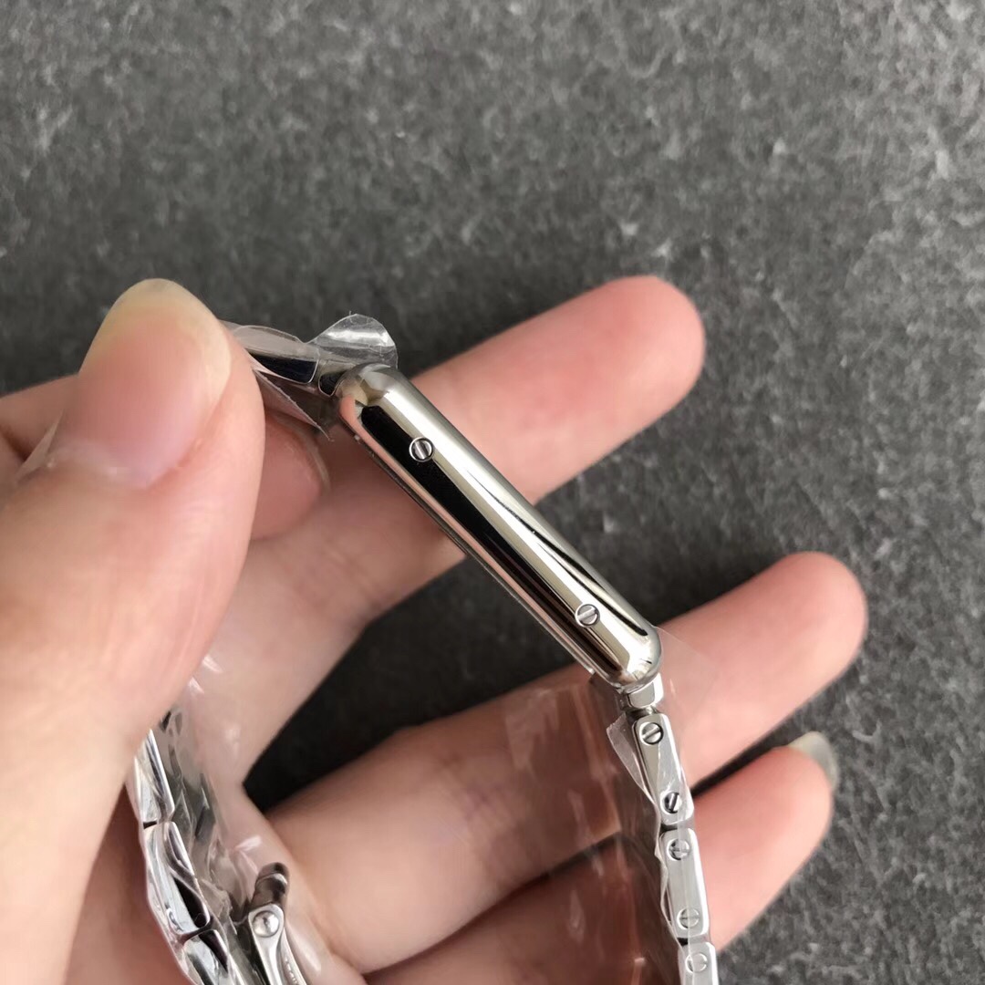 Cartier Women's Tank Solo Watch! Blue-steel hands with heat-treated finish. Case sides feature authentic flat-head screws identical to genuine models. Case back exhibits distinct chamfered edges. Paired with original alligator leather strap. Compact dimen