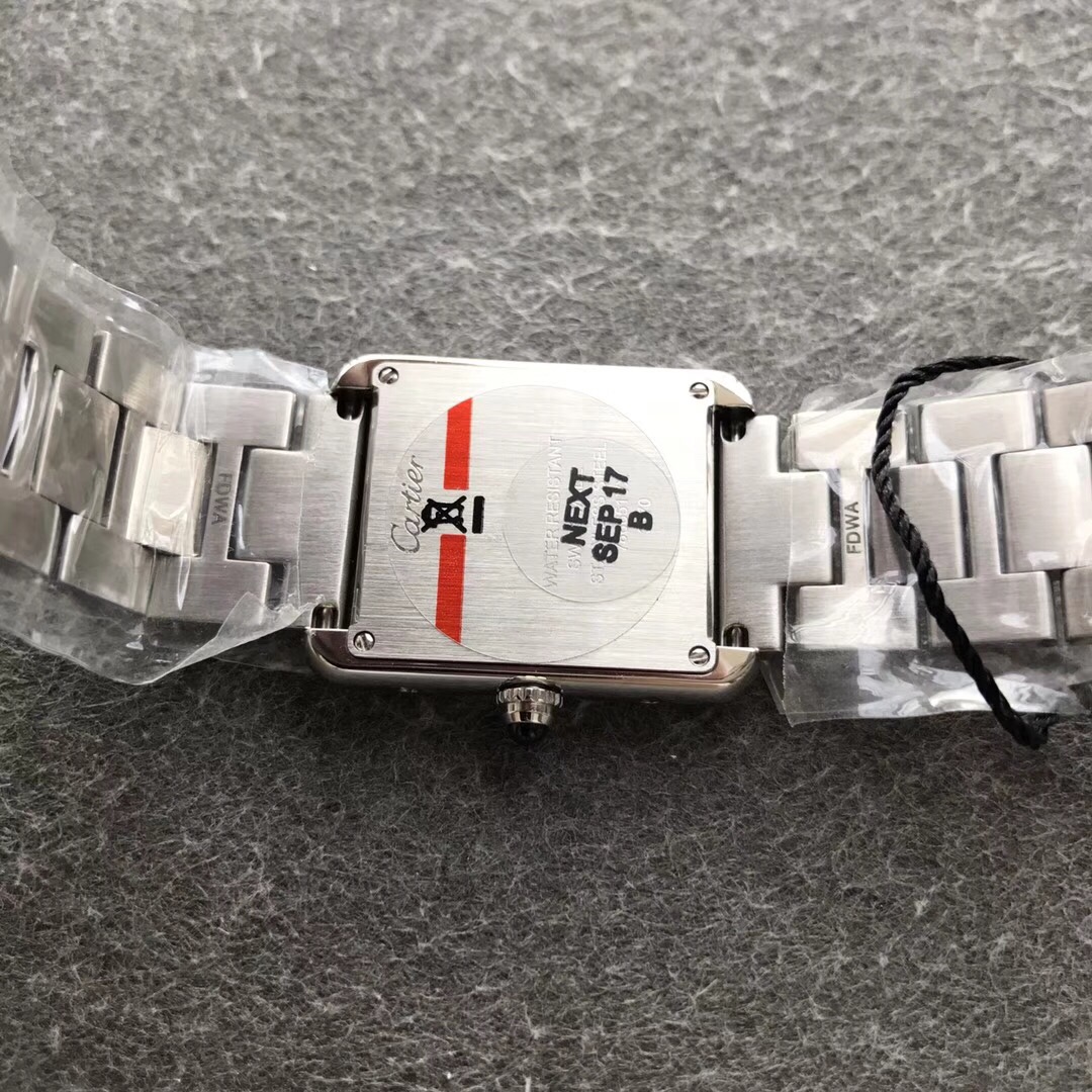 Cartier Women's Tank Solo Watch! Blue-steel hands with heat-treated finish. Case sides feature authentic flat-head screws identical to genuine models. Case back exhibits distinct chamfered edges. Paired with original alligator leather strap. Compact dimen