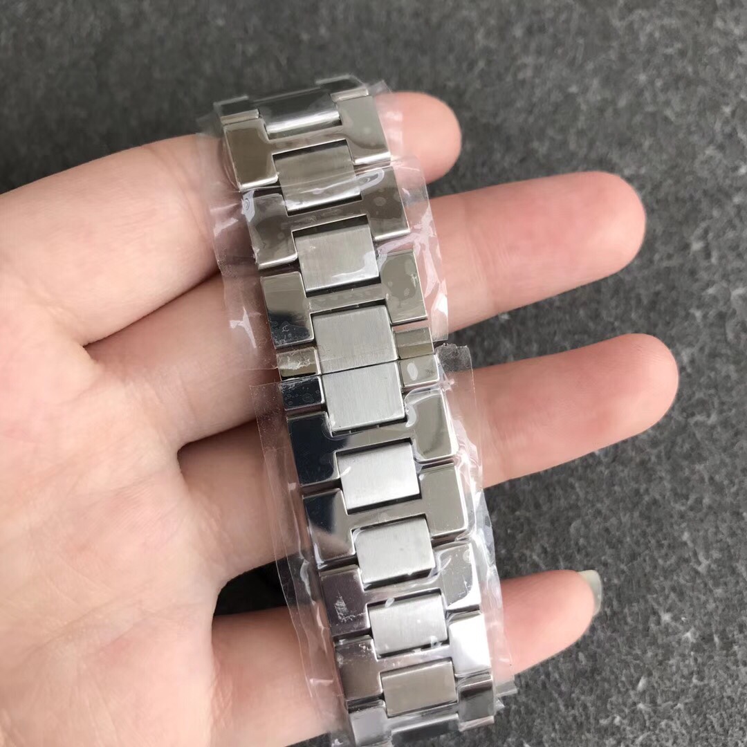 Cartier Women's Tank Solo Watch! Blue-steel hands with heat-treated finish. Case sides feature authentic flat-head screws identical to genuine models. Case back exhibits distinct chamfered edges. Paired with original alligator leather strap. Compact dimen