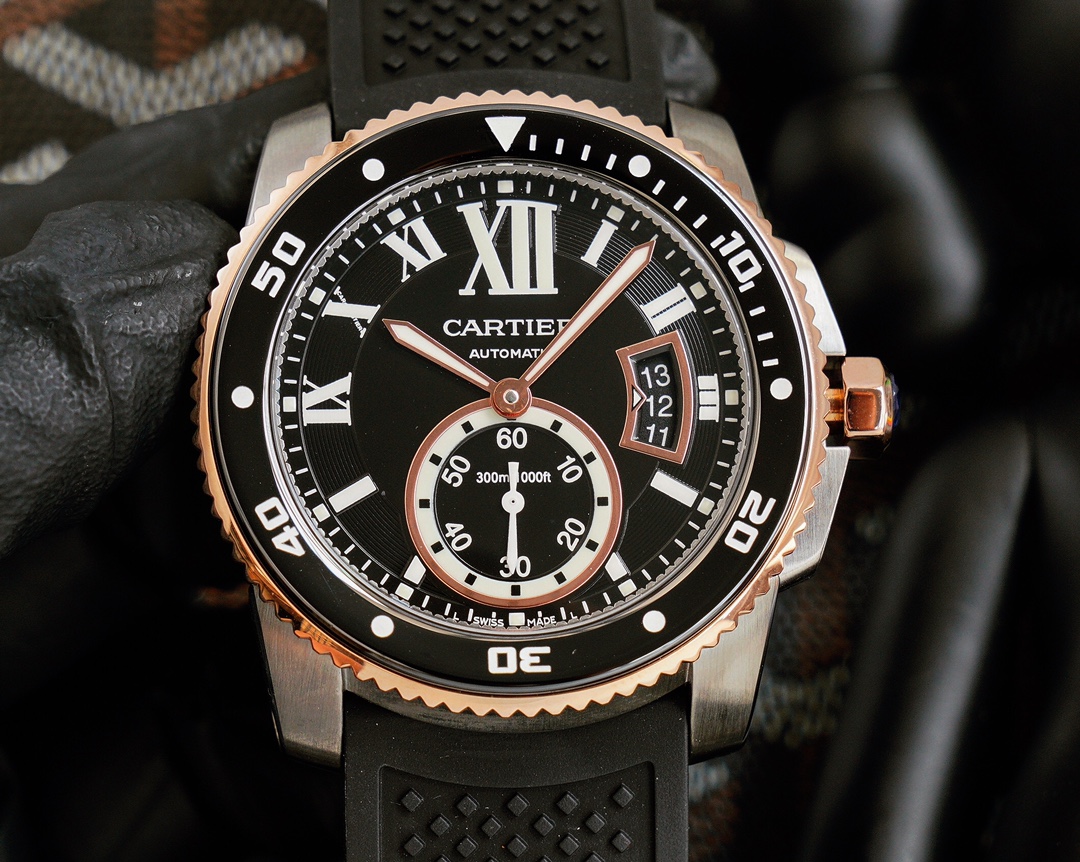 Cartier Calibre de Cartier Diver Collection, 316L stainless steel case, ceramic bezel with luminescent markers, sapphire crystal with blue anti-reflective coating, 42x11mm dimensions. Powered by the Calibre 1904-PS automatic mechanical movement. This dive