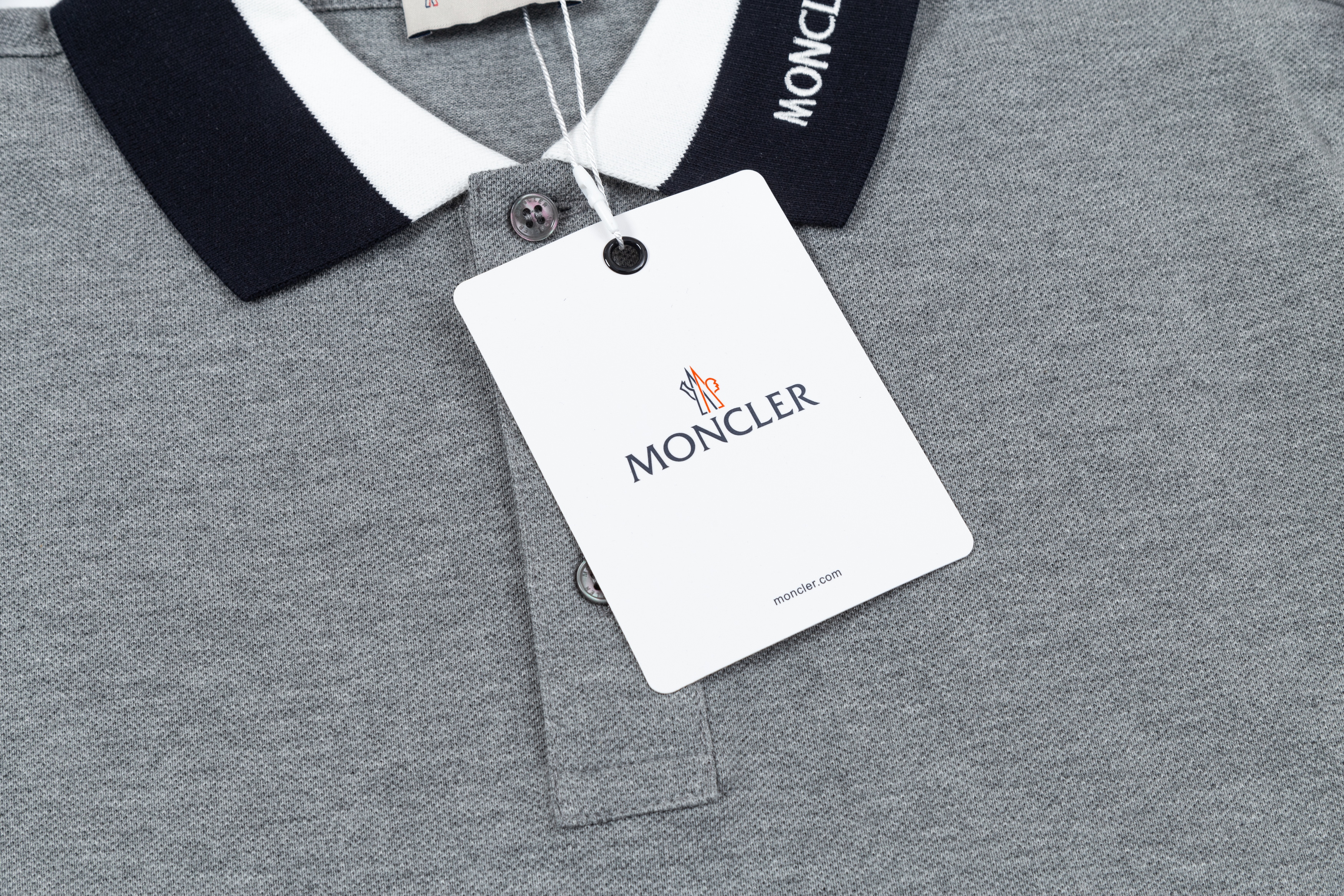 Moncler Cotton Piqué Short-Sleeve Top - Knitted Collar, Mother Of Pearl Button Closure, Embroidered Logo