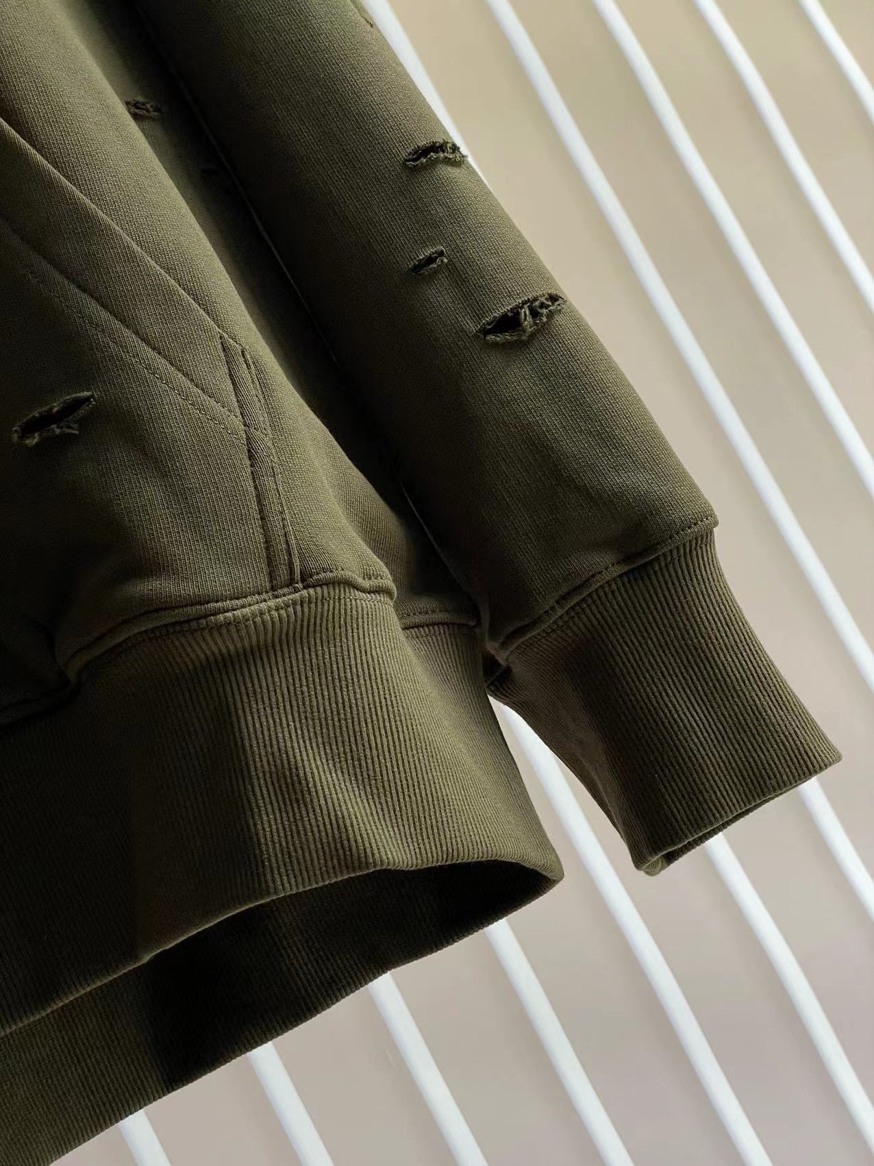 GIVENCHY Distressed Hole Relaxed Hoodie