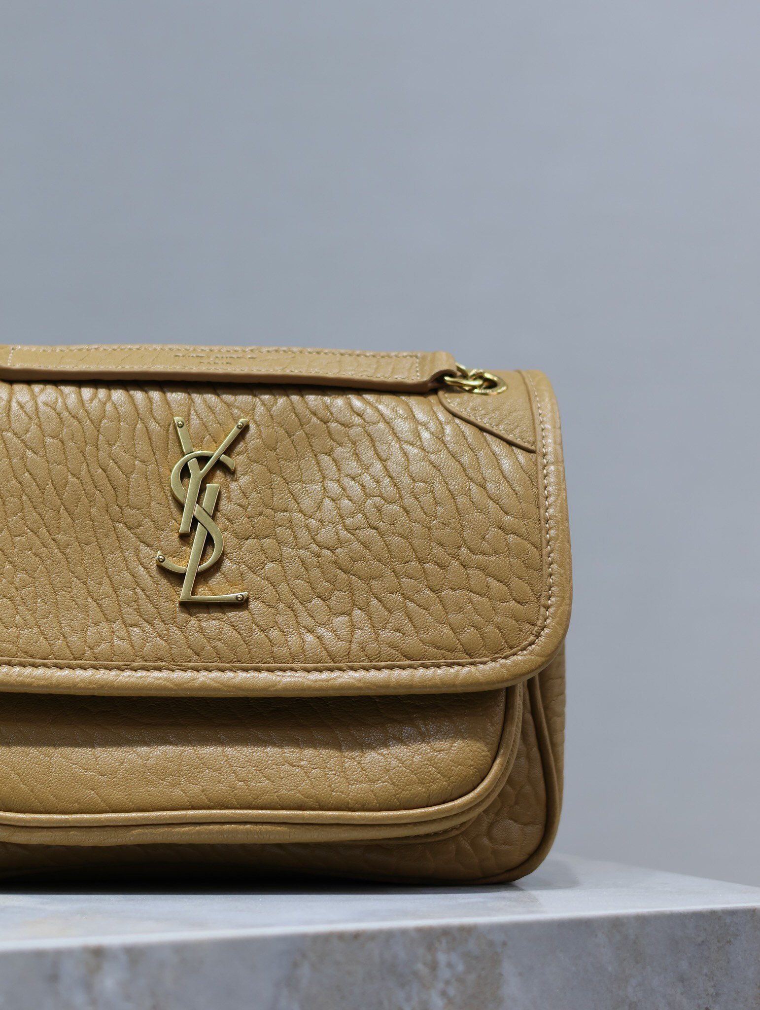 YSL Niki 22cm Earth-Tone Elephant Print with Gold Buckle Style Number: 633151 Dimensions: 22 × 16.5 × 12 cm