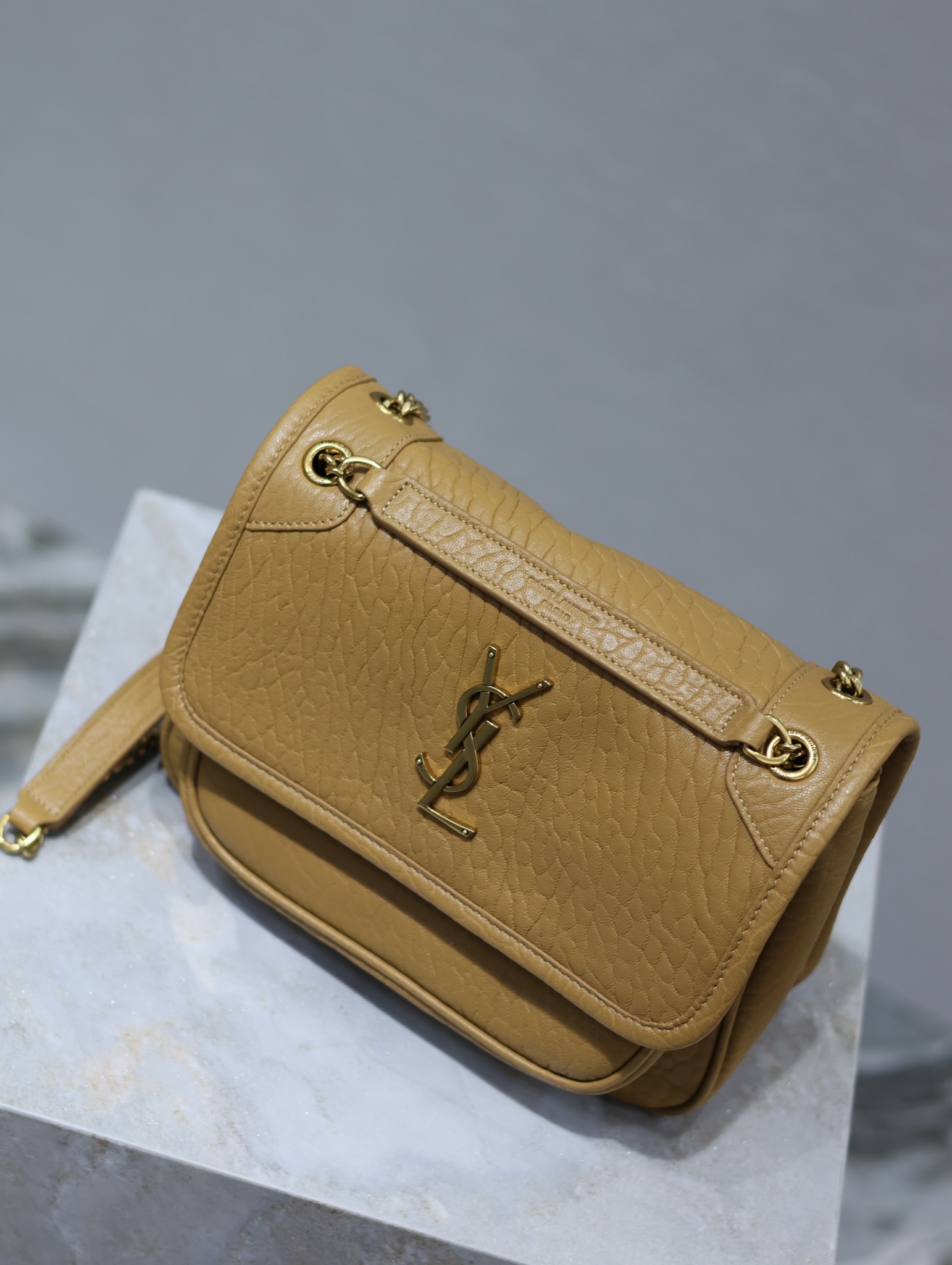 YSL Niki 22cm Earth-Tone Elephant Print with Gold Buckle Style Number: 633151 Dimensions: 22 × 16.5 × 12 cm