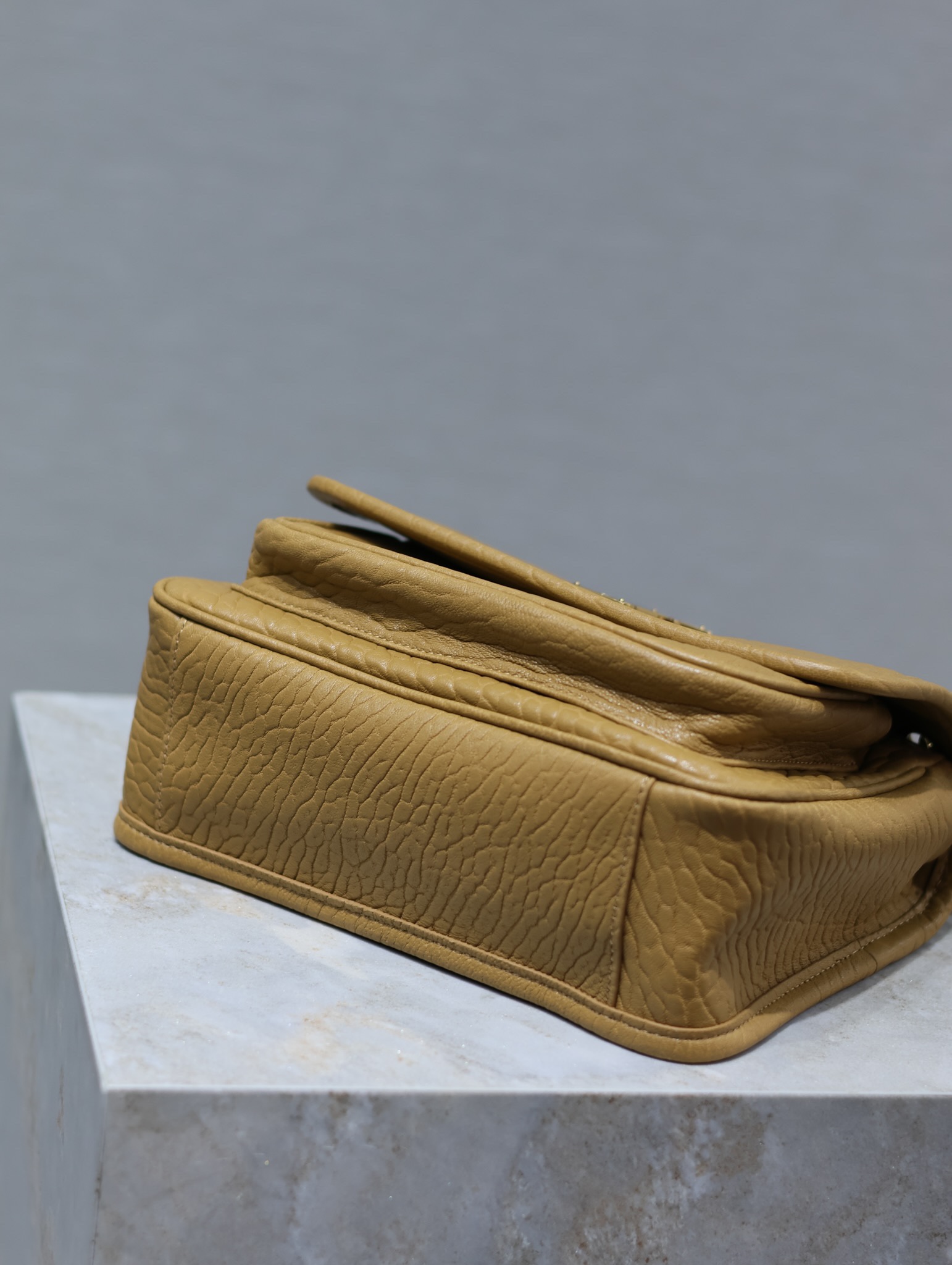 YSL Niki 22cm Earth-Tone Elephant Print with Gold Buckle Style Number: 633151 Dimensions: 22 × 16.5 × 12 cm