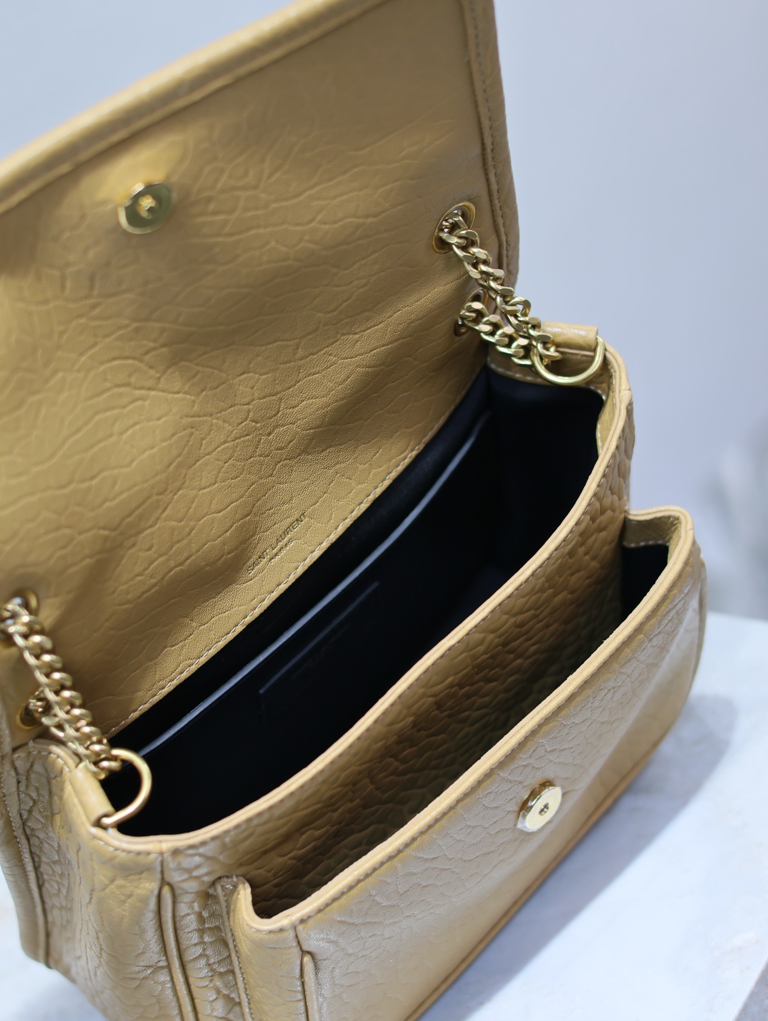 YSL Niki 22cm Earth-Tone Elephant Print with Gold Buckle Style Number: 633151 Dimensions: 22 × 16.5 × 12 cm