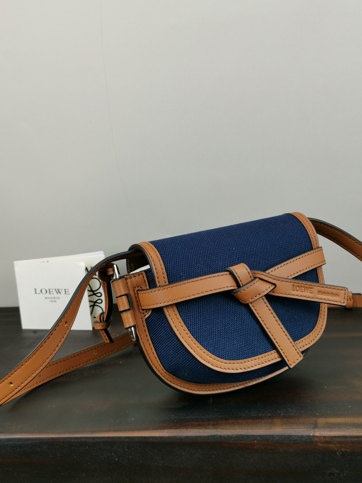 Loewe Mini Canvas and Leather Gate Dual Handbag Dimensions: 21 x 12 x 10 cm Model: 56T17 Color: Navy Blue/Tan