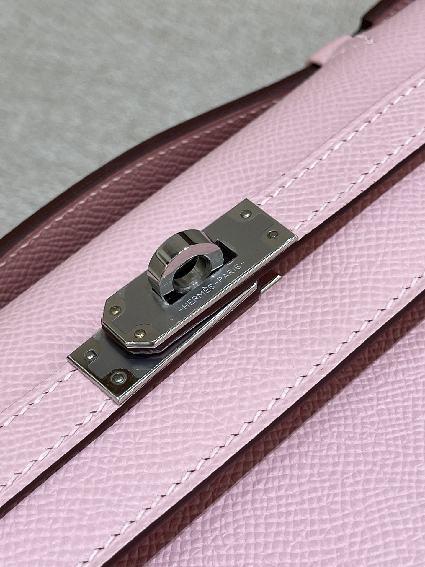 Hermès Model: Kelly Mini First Generation Color: 3Q Cherry Blossom Pink with Silver Buckle Dimensions: 22cm x 14cm x 7cm