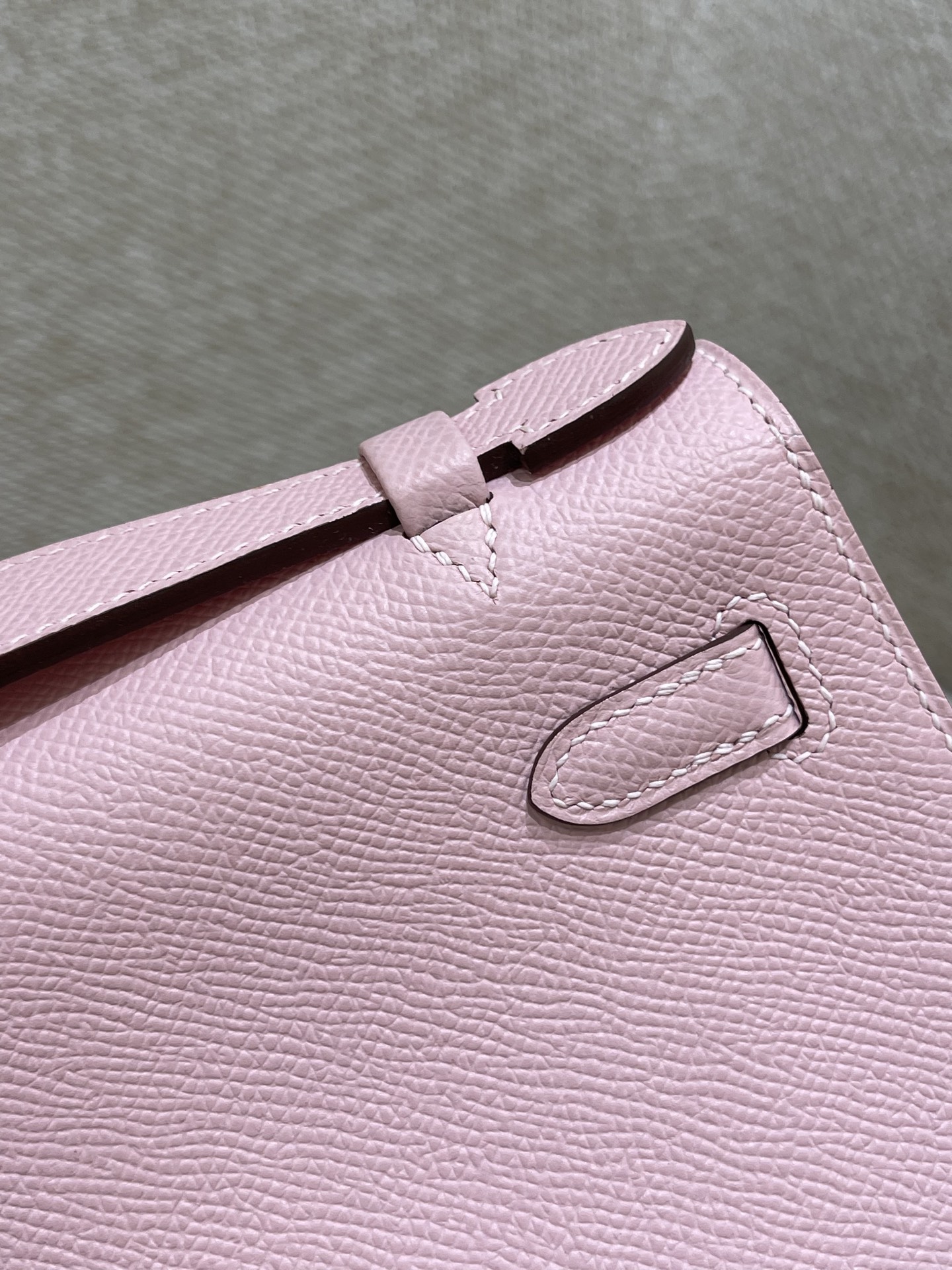 Hermès Model: Kelly Mini First Generation Color: 3Q Cherry Blossom Pink with Silver Buckle Dimensions: 22cm x 14cm x 7cm