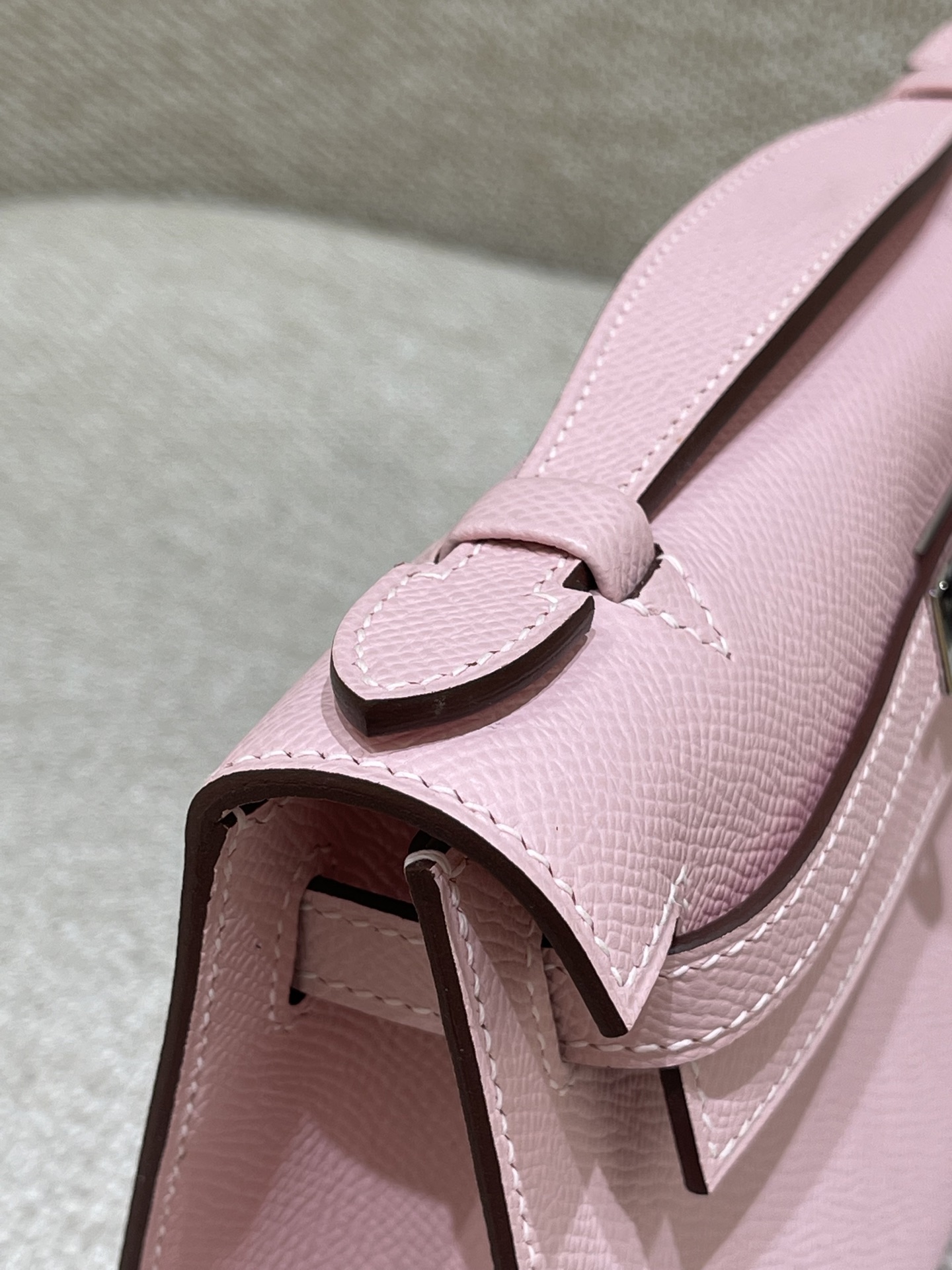 Hermès Model: Kelly Mini First Generation Color: 3Q Cherry Blossom Pink with Silver Buckle Dimensions: 22cm x 14cm x 7cm