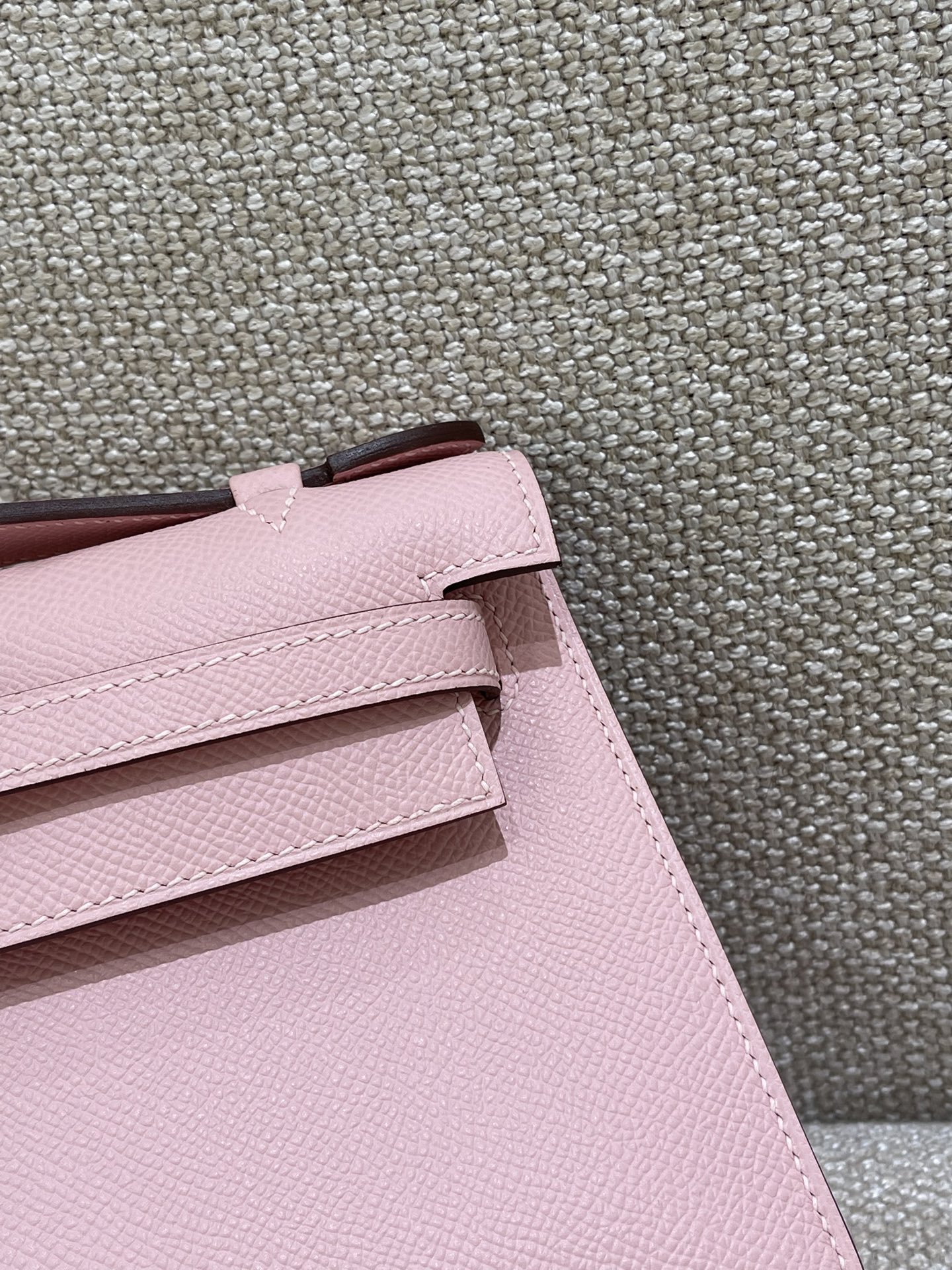 Hermès Model: Kelly Mini First Generation Color: 3Q Cherry Blossom Pink with Silver Buckle Dimensions: 22cm x 14cm x 7cm