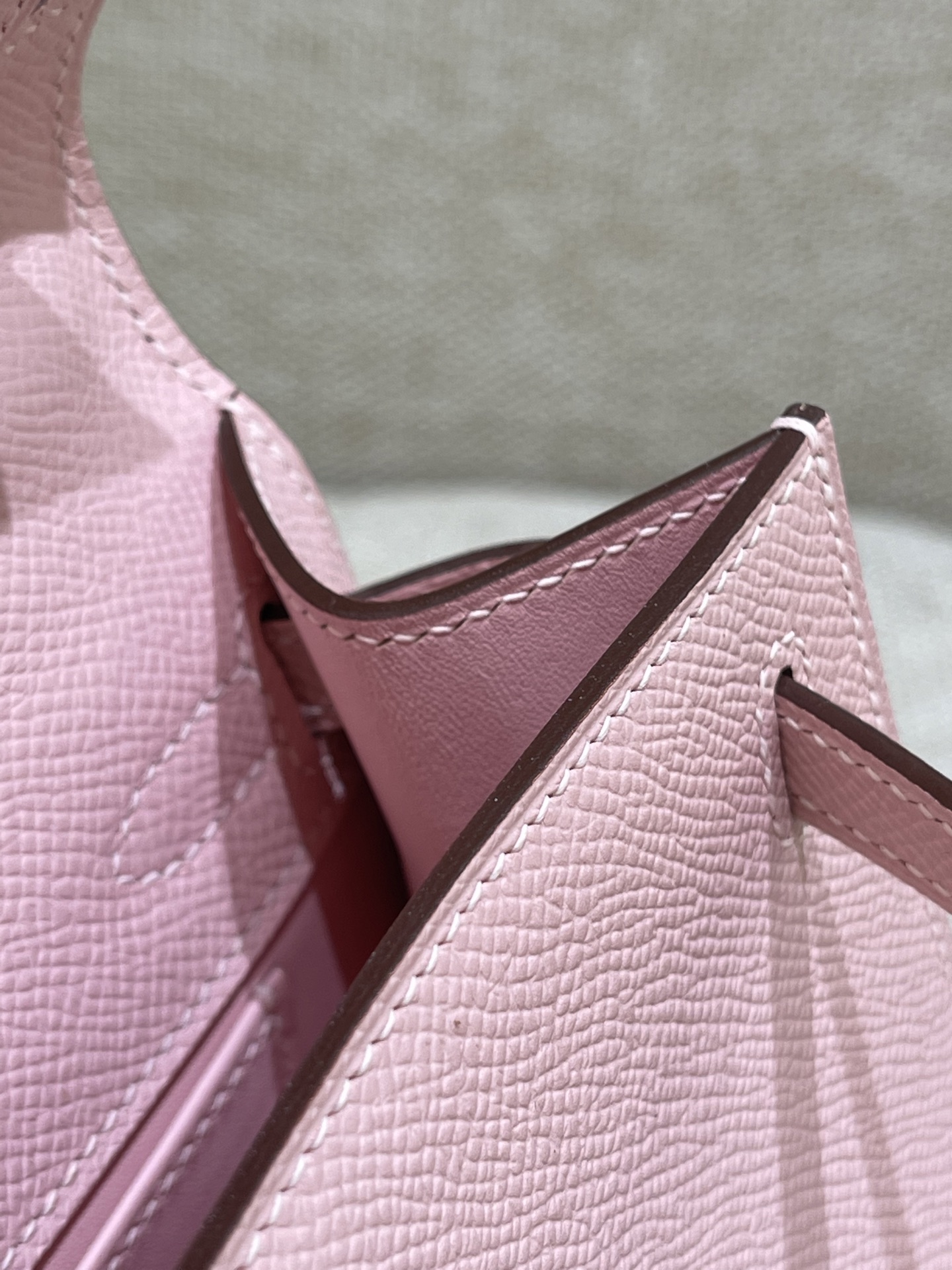 Hermès Model: Kelly Mini First Generation Color: 3Q Cherry Blossom Pink with Silver Buckle Dimensions: 22cm x 14cm x 7cm