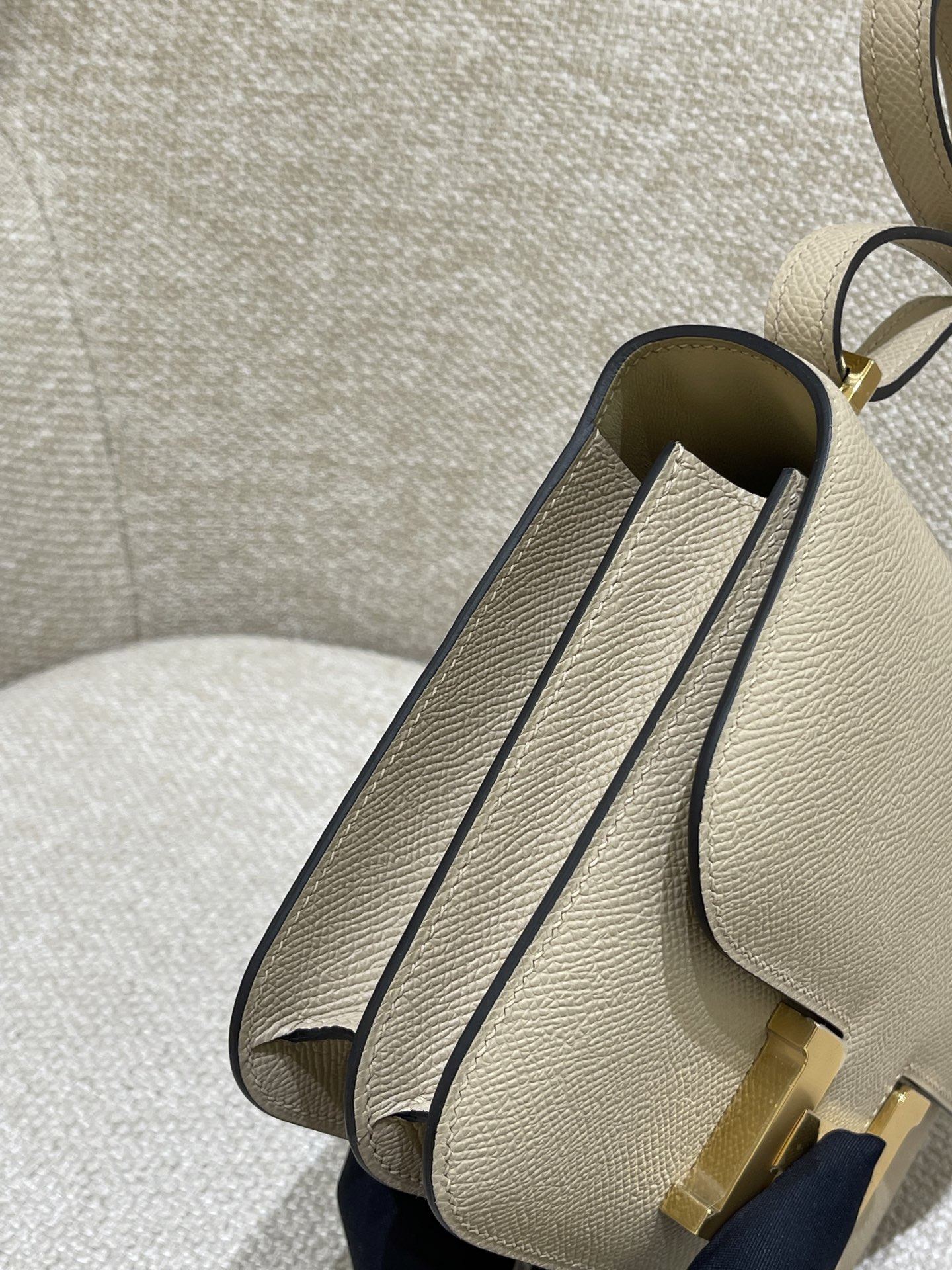 Hermès Model: Constance 19 Color: Trench Gray with Gold Hardware Dimensions: 19cm x 15cm x 4cm