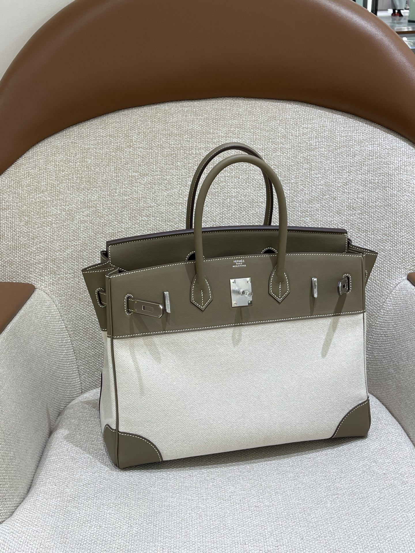 Hermès Model: Birkin 35 Color: Glacier White with Canvas Accents, Silver Hardware Dimensions: 35cm x 25cm x 18cm
