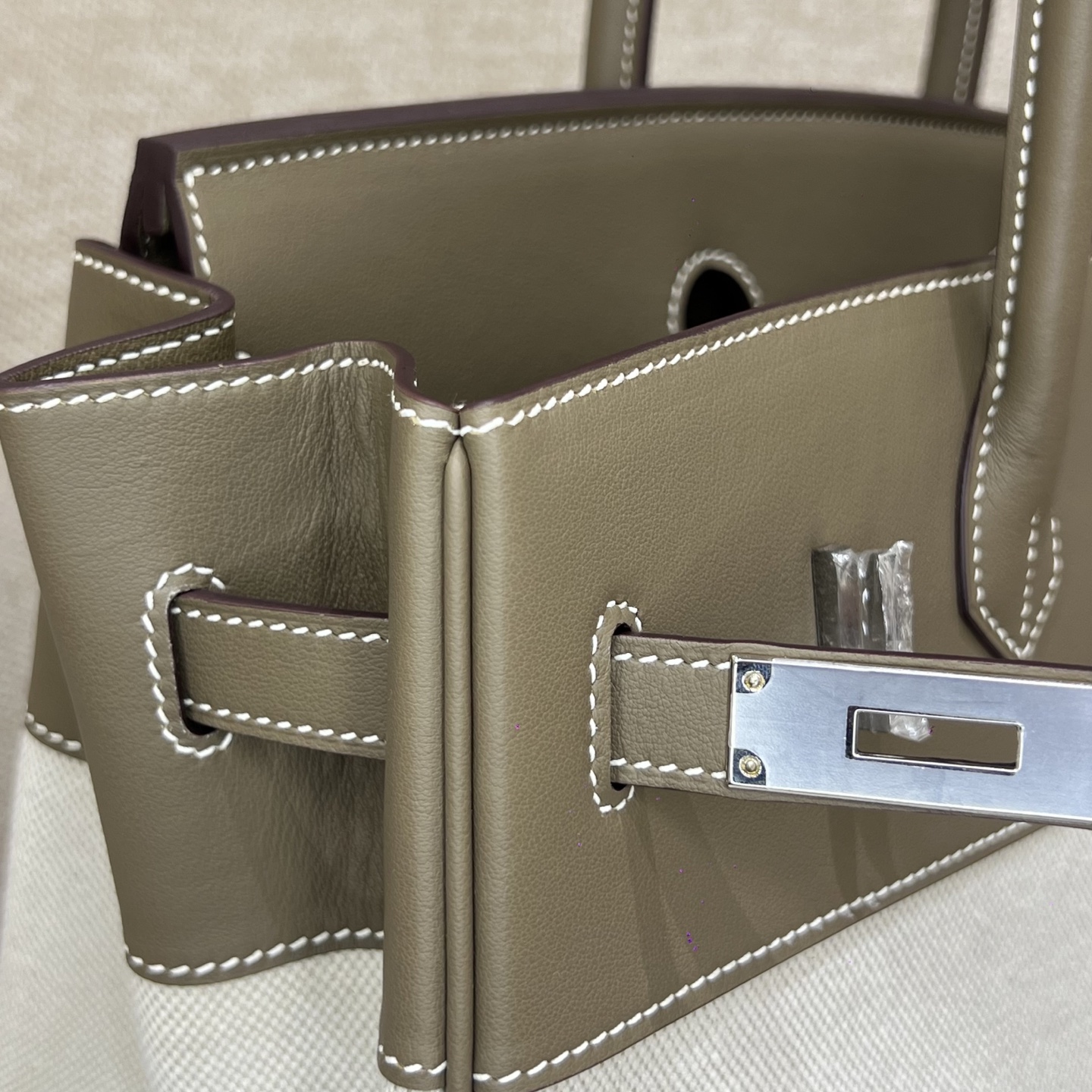 Hermès Model: Birkin 35 Color: Glacier White with Canvas Accents, Silver Hardware Dimensions: 35cm x 25cm x 18cm