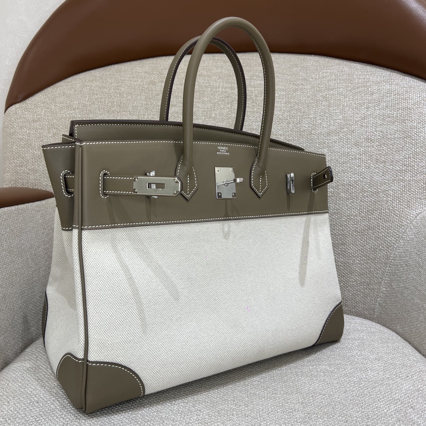 Hermès Model: Birkin 35 Color: Glacier White with Canvas Accents, Silver Hardware Dimensions: 35cm x 25cm x 18cm