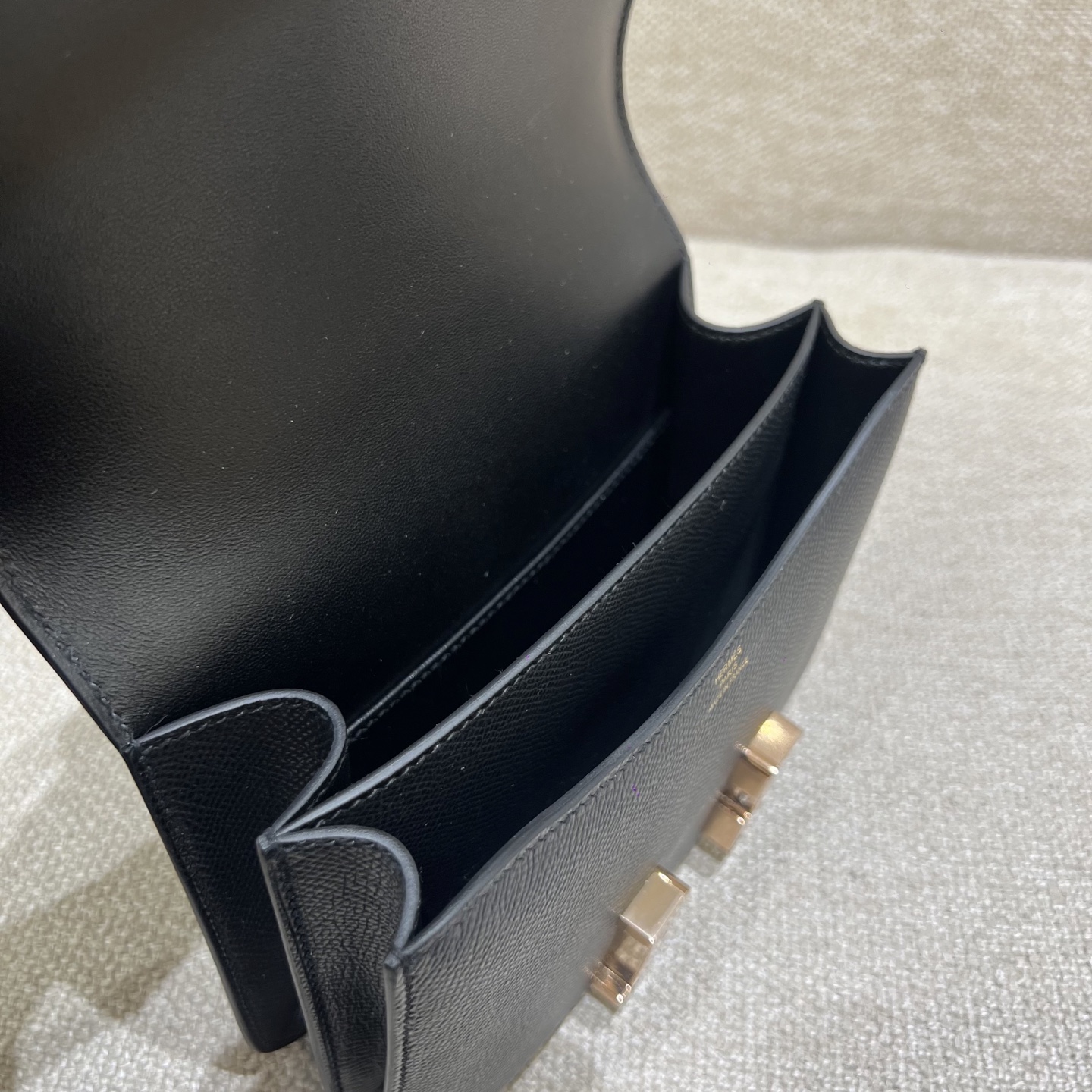 Hermès Model: Constance 19 Color: Black with rose gold hardware Dimensions: 19cm x 15cm x 4cm
