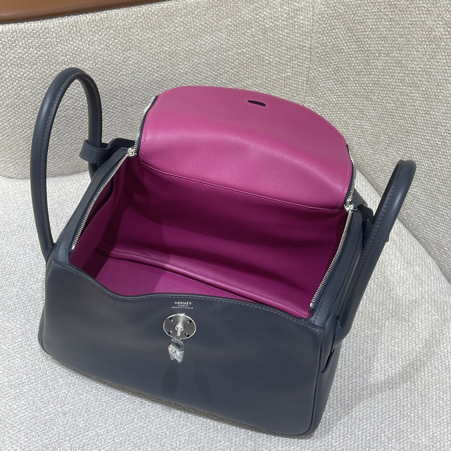 Hermès Model: Lindy 26 Color: Midnight Blue with Rose Purple Accents, Silver Buckle Dimensions: 26cm x 18cm x 13cm