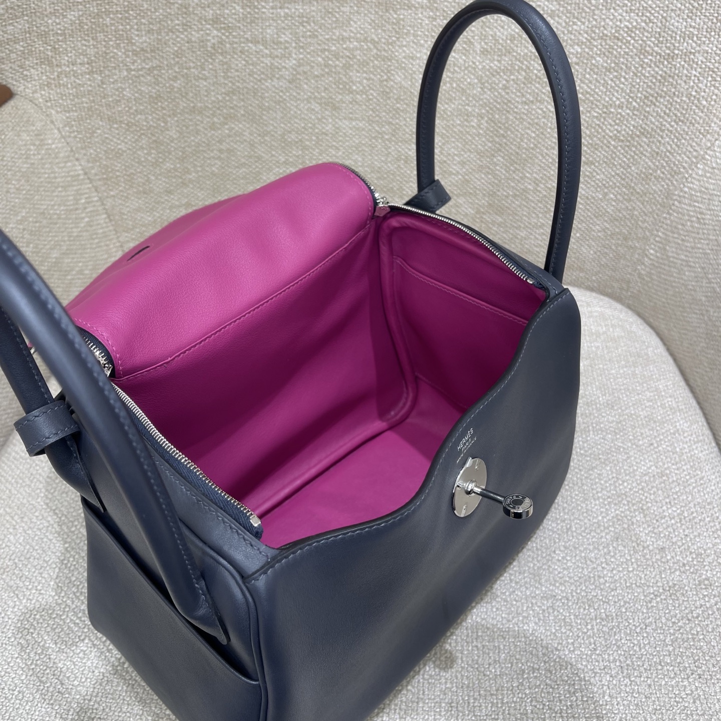 Hermès Model: Lindy 26 Color: Midnight Blue with Rose Purple Accents, Silver Buckle Dimensions: 26cm x 18cm x 13cm