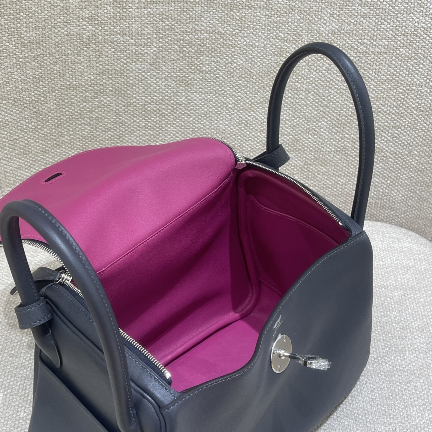 Hermès Model: Lindy 26 Color: Midnight Blue with Rose Purple Accents, Silver Buckle Dimensions: 26cm x 18cm x 13cm