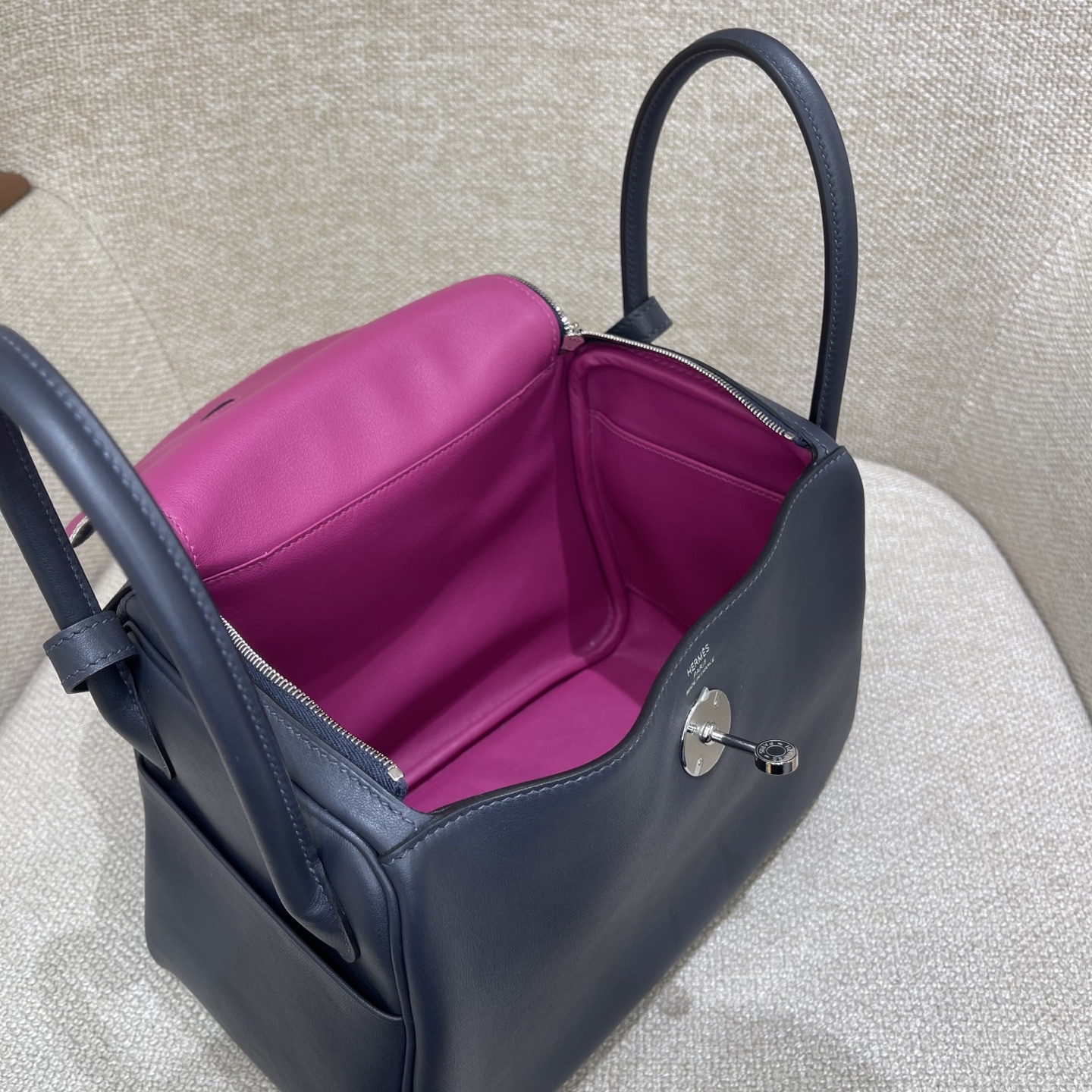 Hermès Model: Lindy 26 Color: Midnight Blue with Rose Purple Accents, Silver Buckle Dimensions: 26cm x 18cm x 13cm