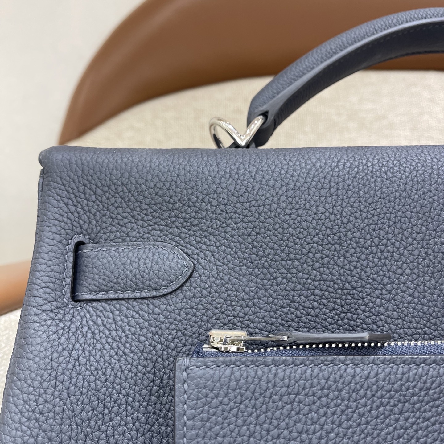 Hermès Model: Kelly Maxi 42 Color: Black with silver hardware Dimensions: 42 × 30 × 14 cm (including handles)