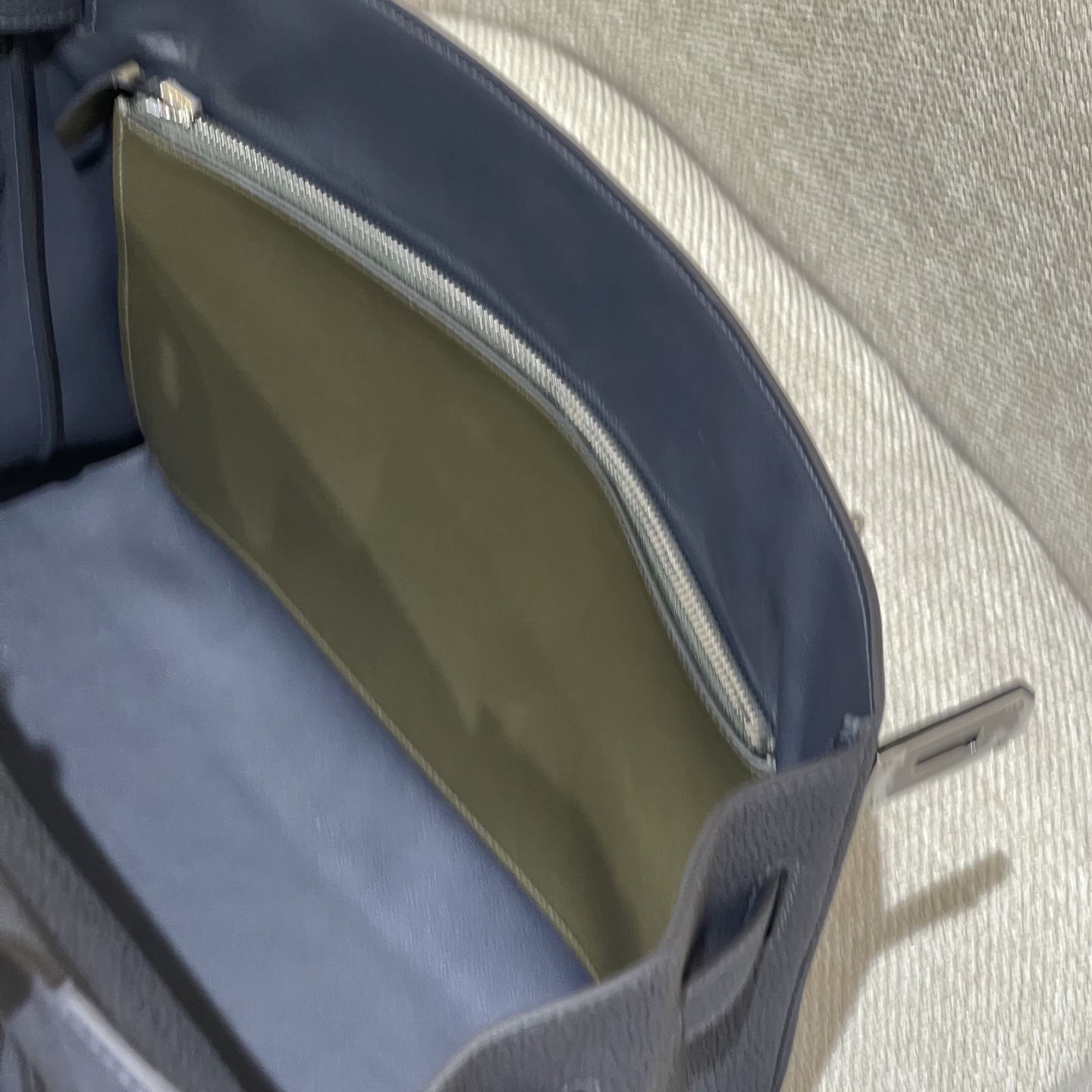 Hermès Model: Kelly Maxi 42 Color: Black with silver hardware Dimensions: 42 × 30 × 14 cm (including handles)