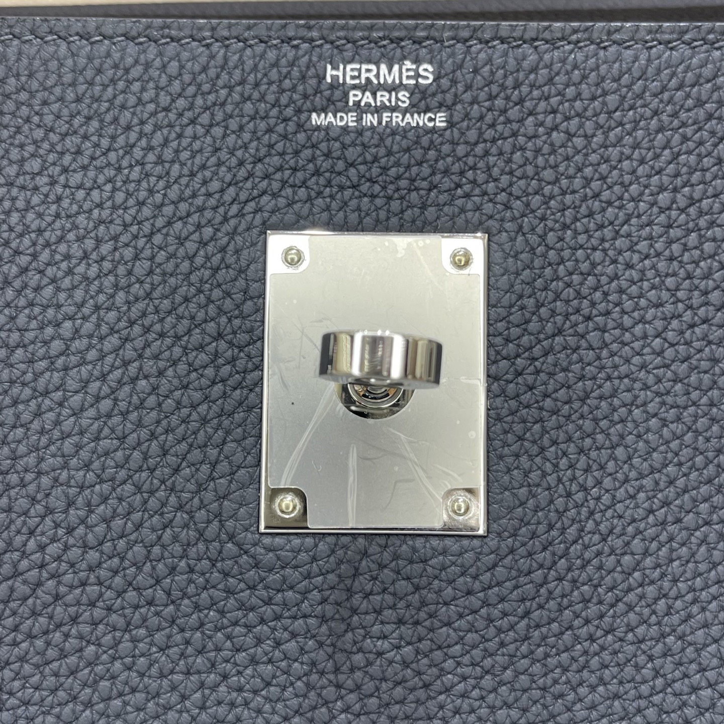 Hermès Model: Kelly Maxi 42 Color: Black with silver hardware Dimensions: 42 × 30 × 14 cm (including handles)