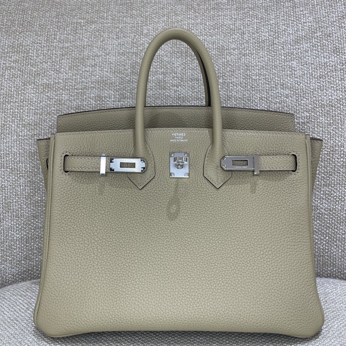 Hermès Model: Birkin 25 Color: Trench Gray with Silver Hardware Dimensions: 25cm x 20cm x 13cm