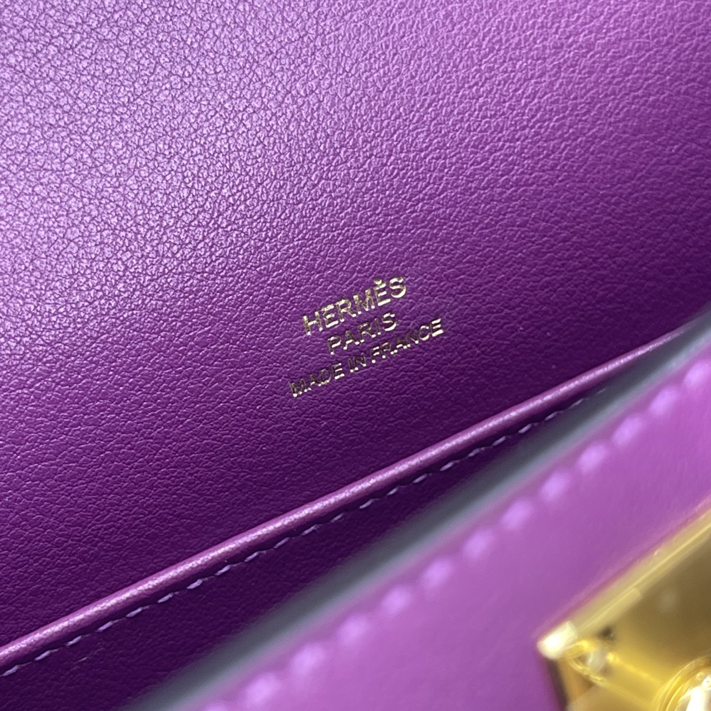 Hermès Model: Kelly Mini First Generation Color: Anemone Purple with Gold Hardware Dimensions: 22cm x 14cm x 7cm