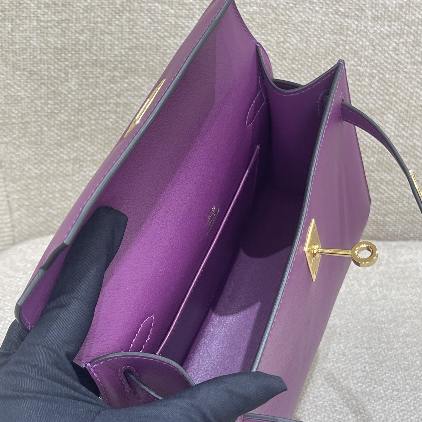 Hermès Model: Kelly Mini First Generation Color: Anemone Purple with Gold Hardware Dimensions: 22cm x 14cm x 7cm