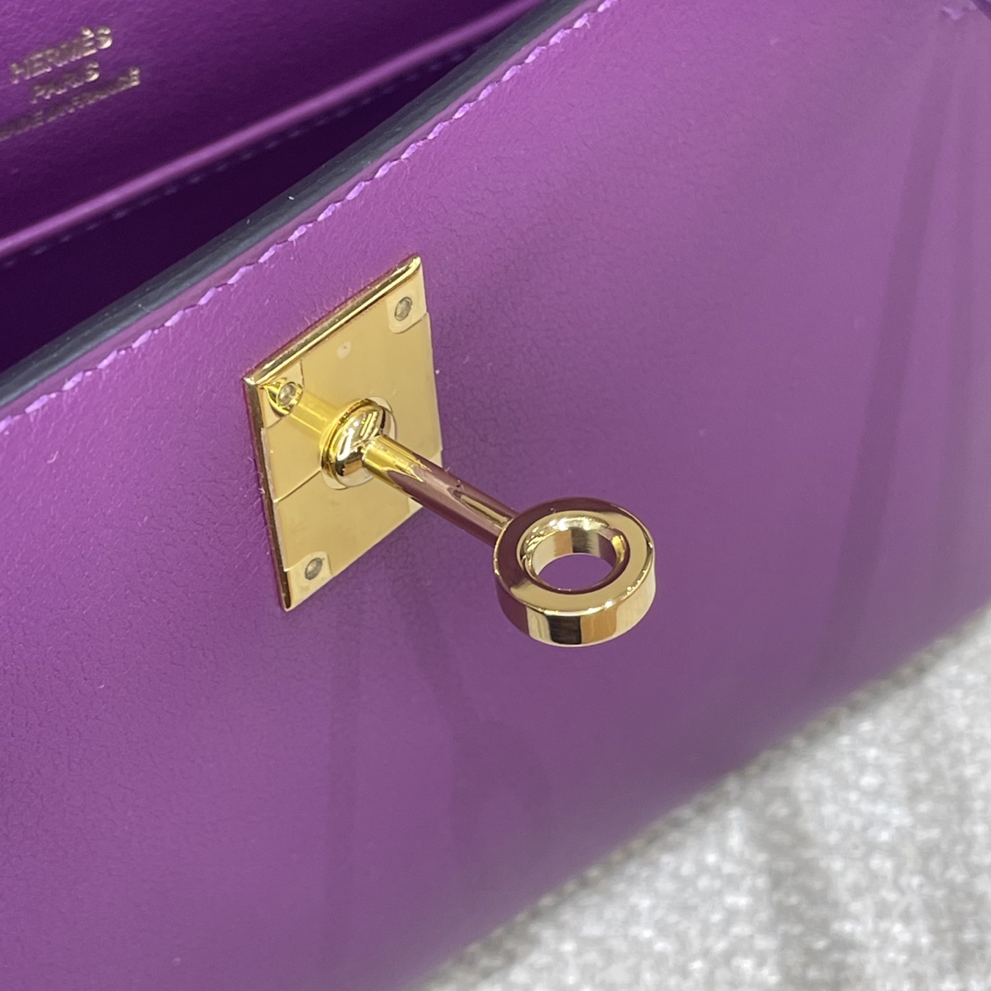 Hermès Model: Kelly Mini First Generation Color: Anemone Purple with Gold Hardware Dimensions: 22cm x 14cm x 7cm