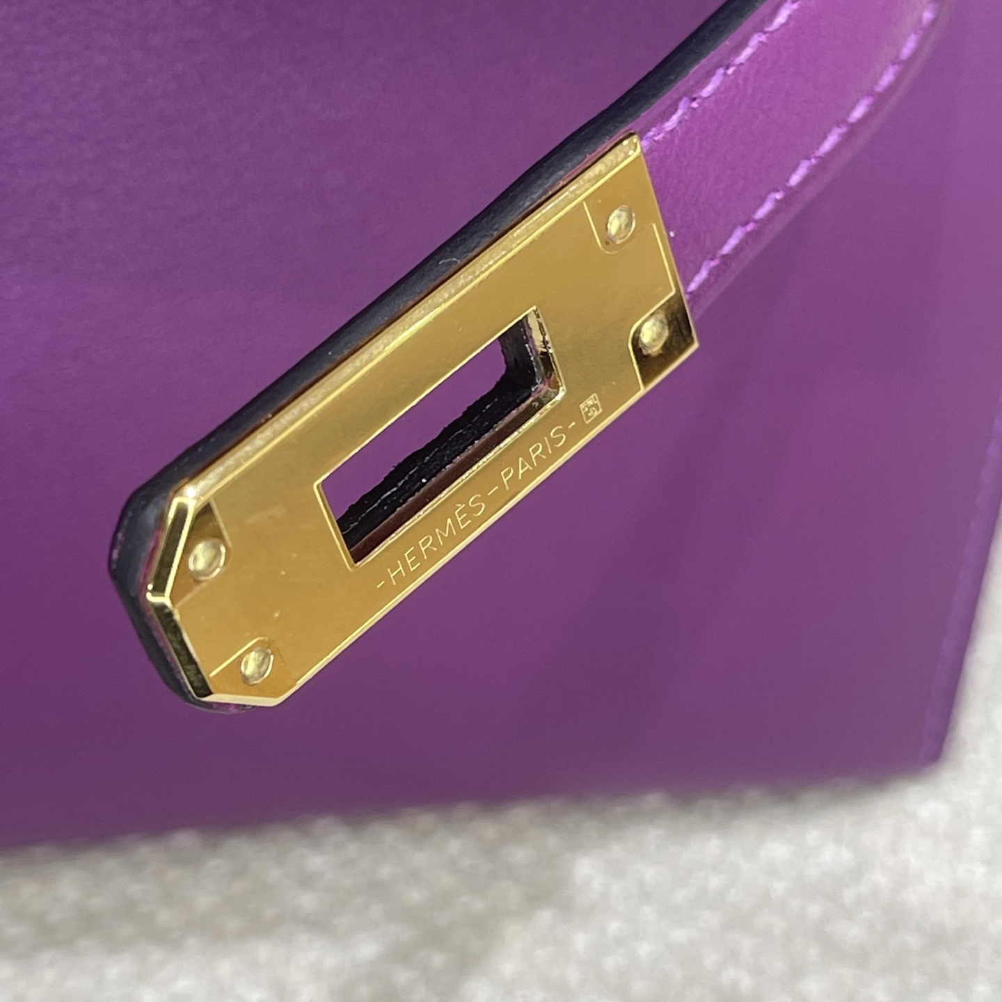 Hermès Model: Kelly Mini First Generation Color: Anemone Purple with Gold Hardware Dimensions: 22cm x 14cm x 7cm
