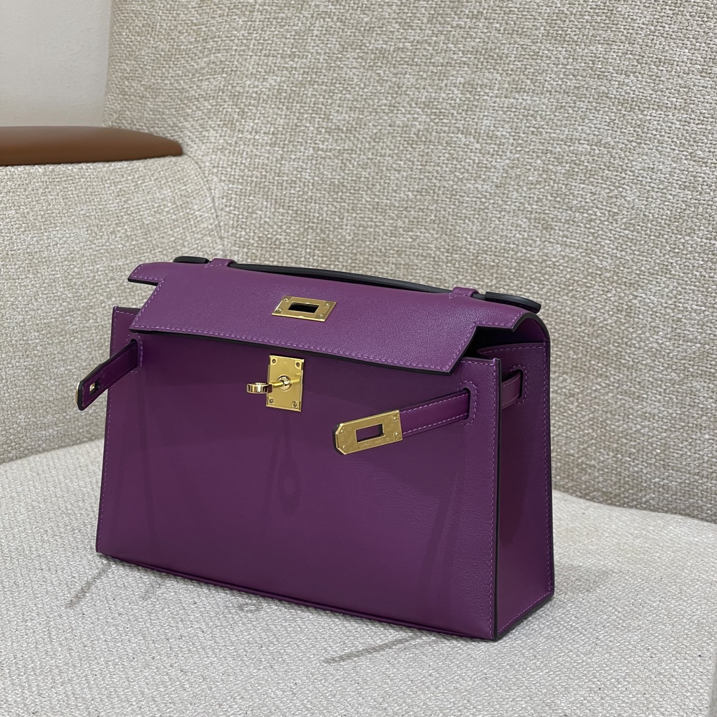 Hermès Model: Kelly Mini First Generation Color: Anemone Purple with Gold Hardware Dimensions: 22cm x 14cm x 7cm