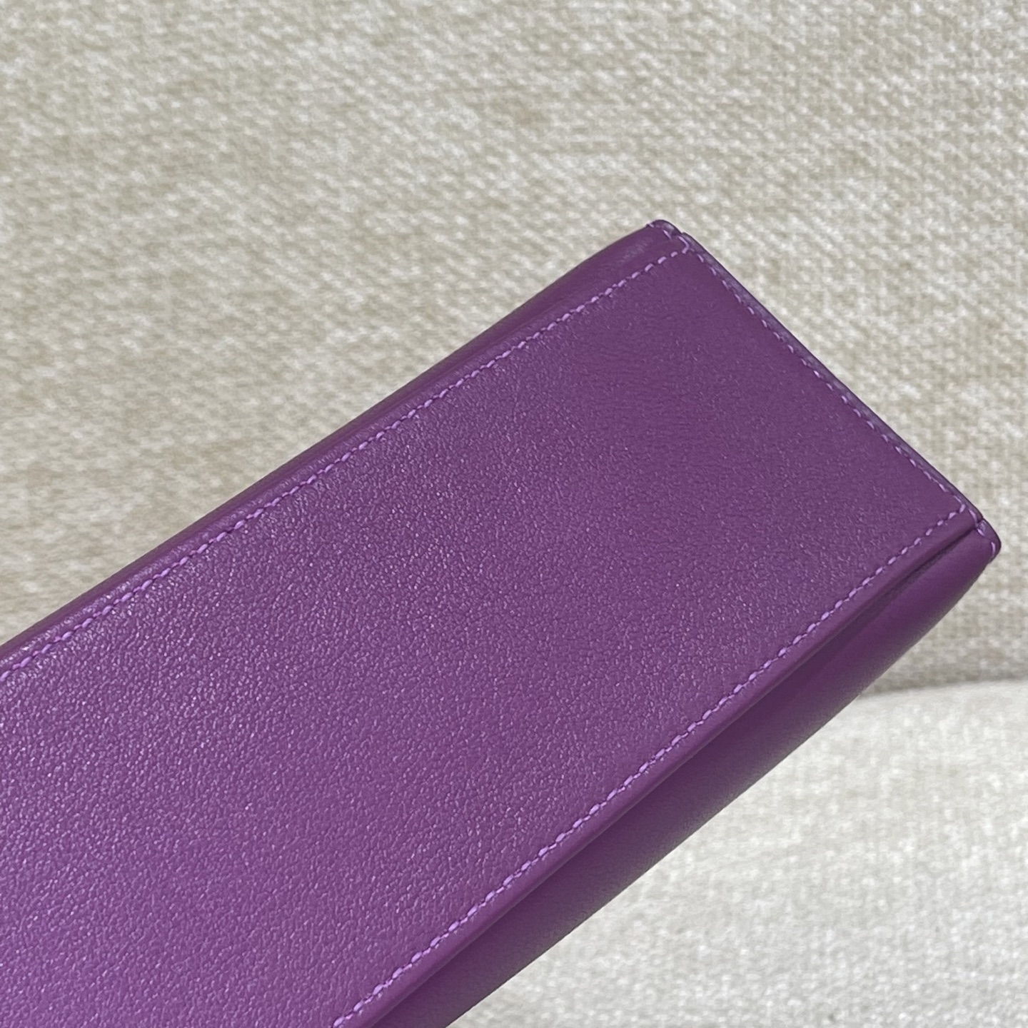 Hermès Model: Kelly Mini First Generation Color: Anemone Purple with Gold Hardware Dimensions: 22cm x 14cm x 7cm