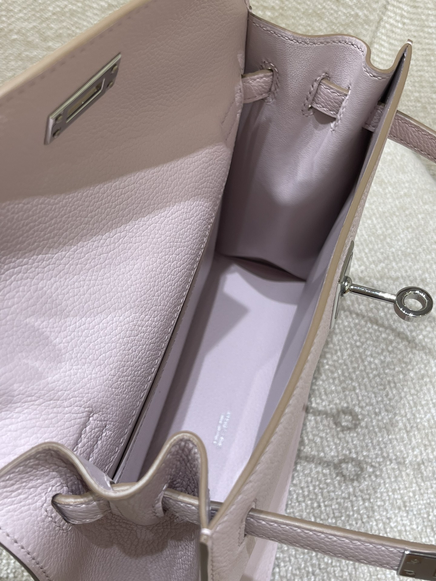 Hermès Model: Kelly Dance Color: Dreamy Purple with Silver Buckle Dimensions: 22*16*5 cm