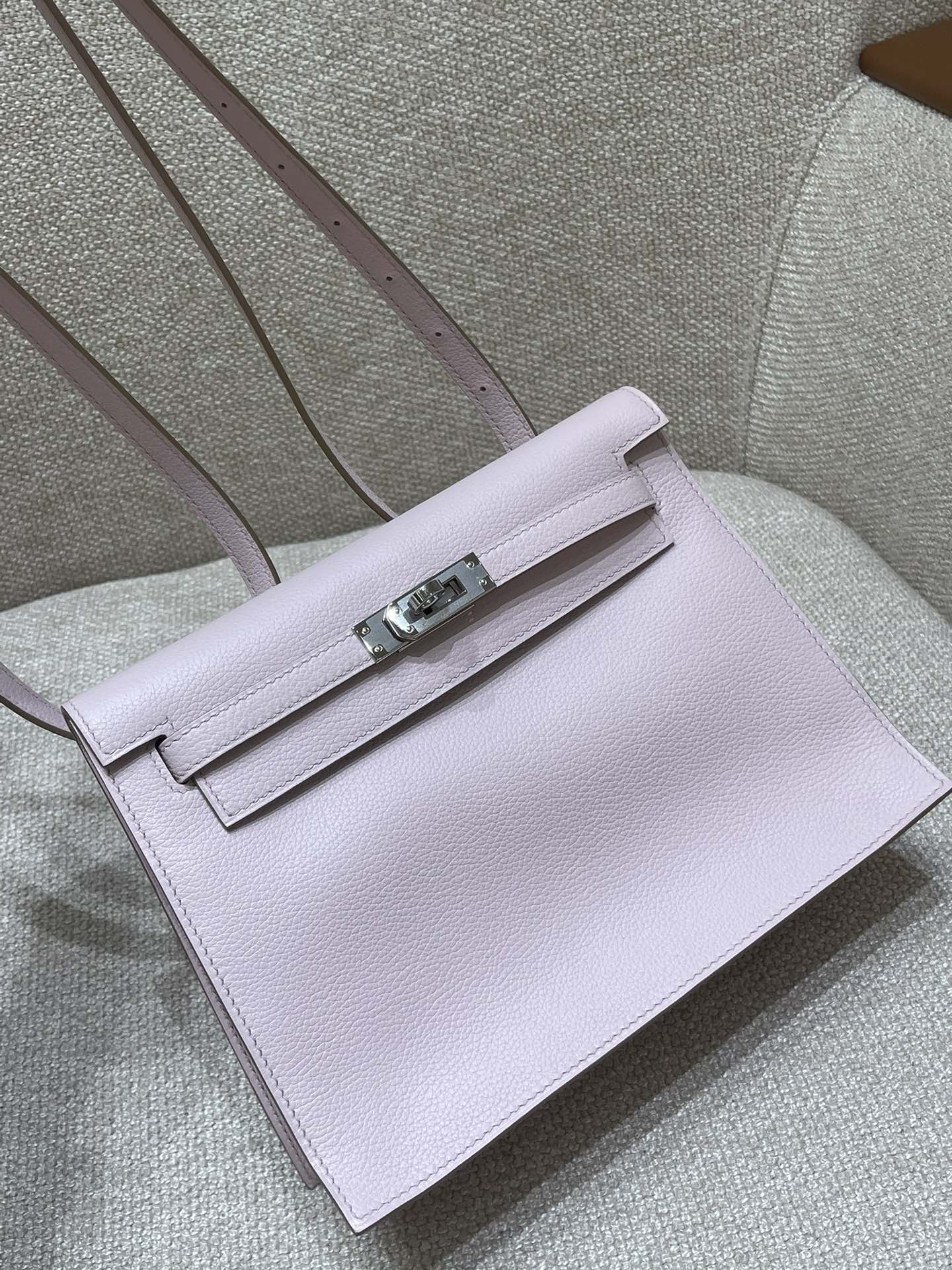Hermès Model: Kelly Dance Color: Dreamy Purple with Silver Buckle Dimensions: 22*16*5 cm