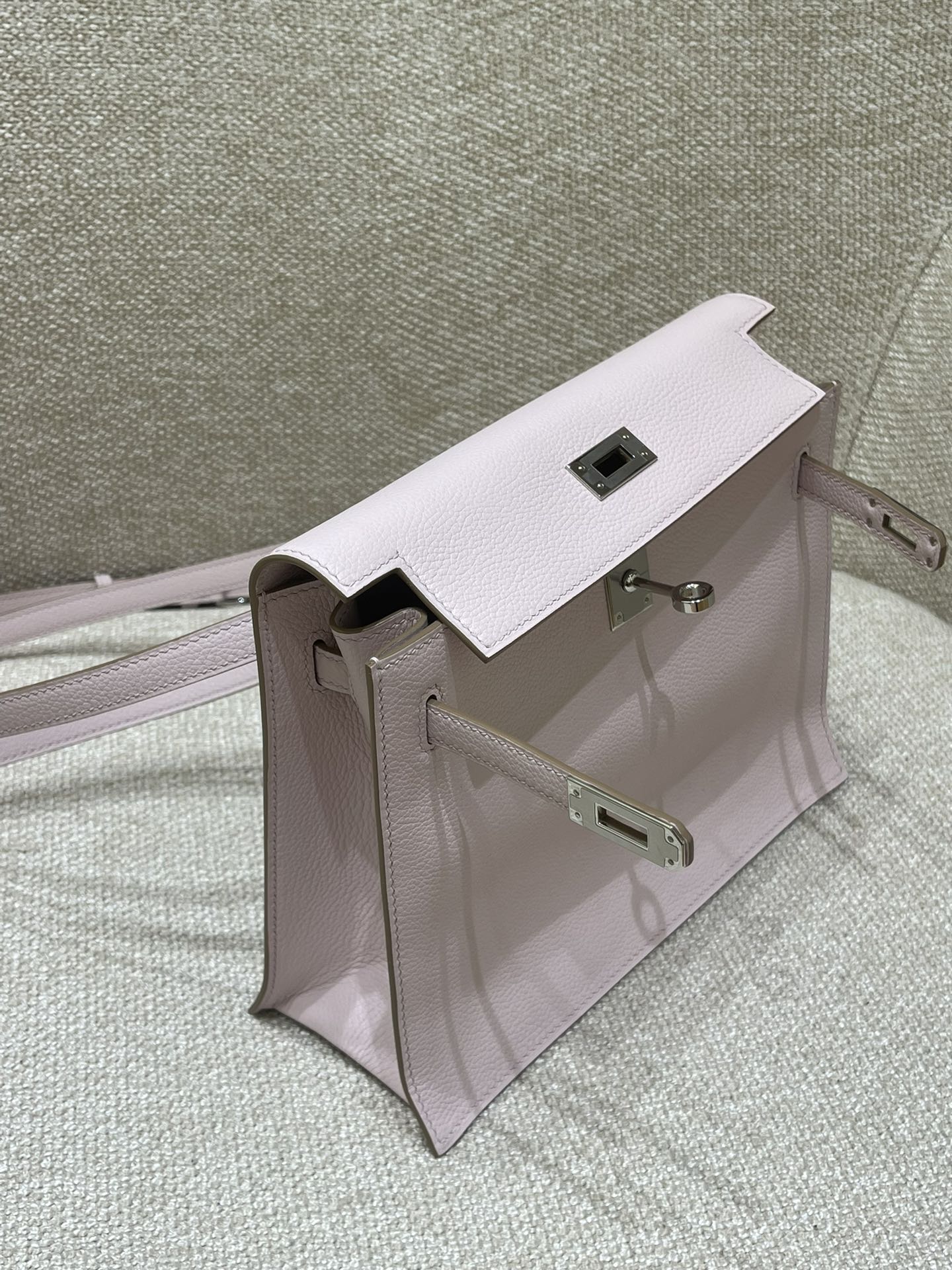 Hermès Model: Kelly Dance Color: Dreamy Purple with Silver Buckle Dimensions: 22*16*5 cm