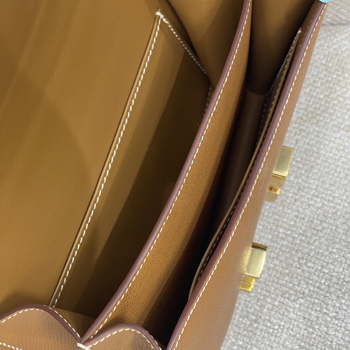 Hermès Model: Constance 19 Color: Golden Brown with Gold Buckle Dimensions: 19cm x 15cm x 4cm