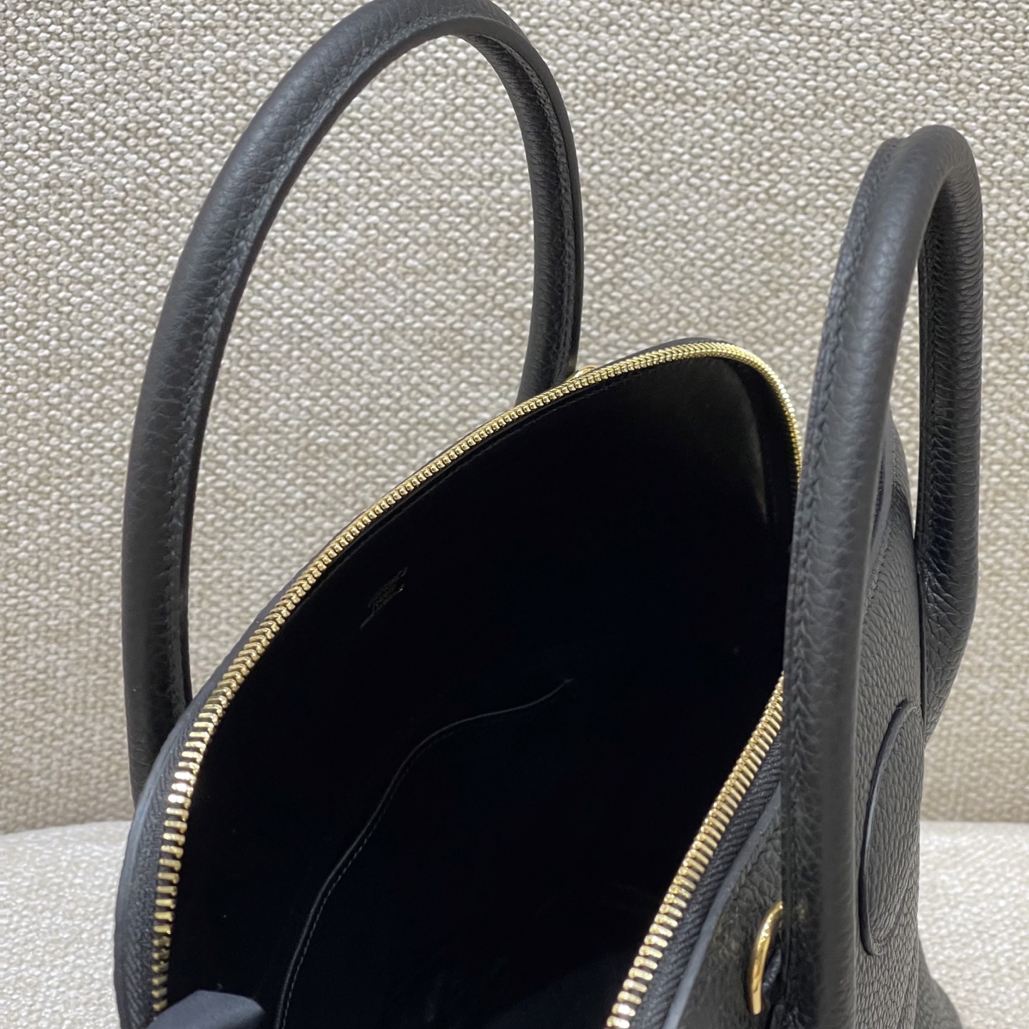 Hermès Model: Bolide 31 Color: Black with gold hardware Dimensions: 31x25x12 cm