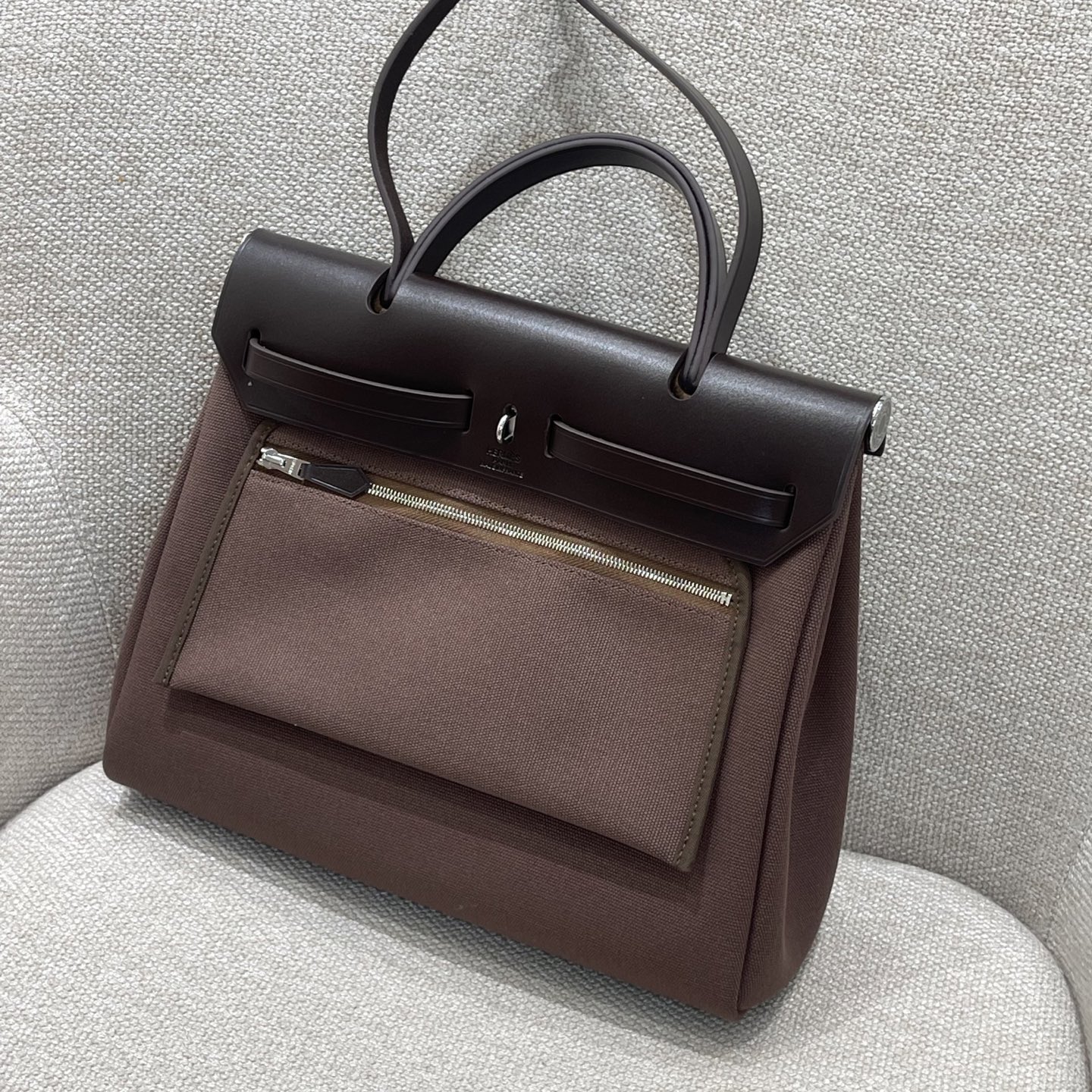 Hermès Model: herbag31 Color: Ebony with silver hardware Dimensions: 31cm x 25cm x 10cm