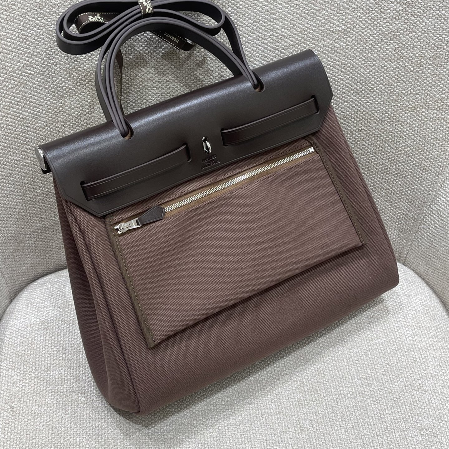 Hermès Model: herbag31 Color: Ebony with silver hardware Dimensions: 31cm x 25cm x 10cm