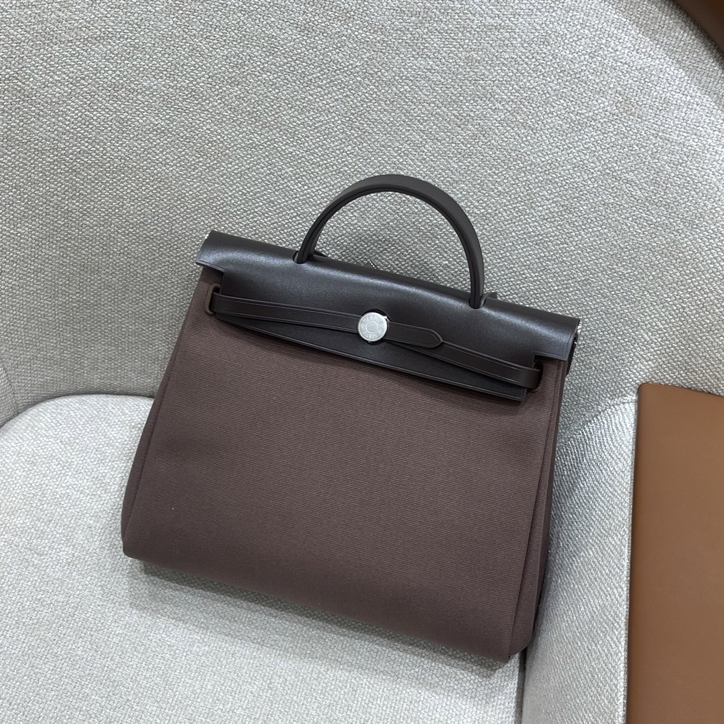Hermès Model: herbag31 Color: Ebony with silver hardware Dimensions: 31cm x 25cm x 10cm