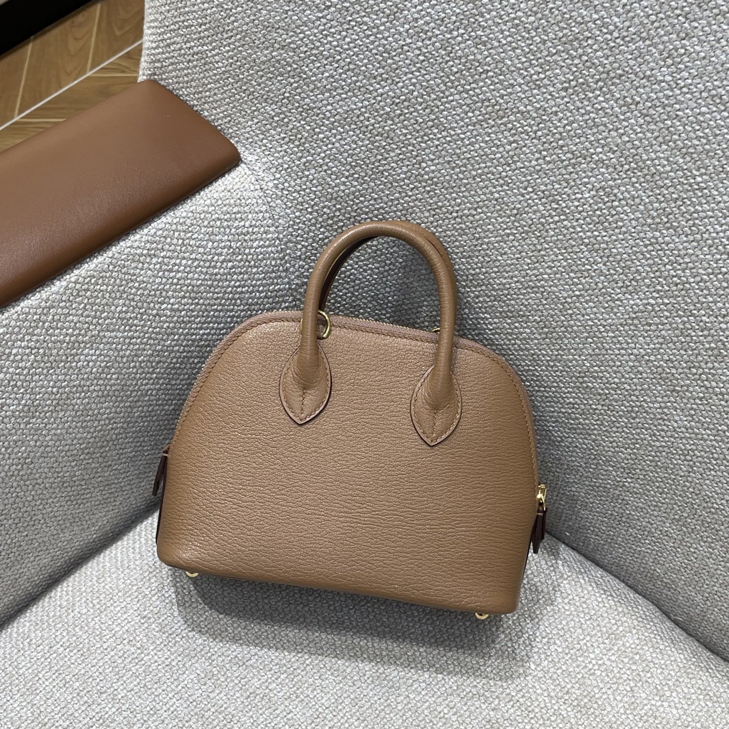 Hermès Model: Mini Bolide Color: Hazel Wood, Gold Dimensions: 18cm x 7cm x 20cm (including handle)