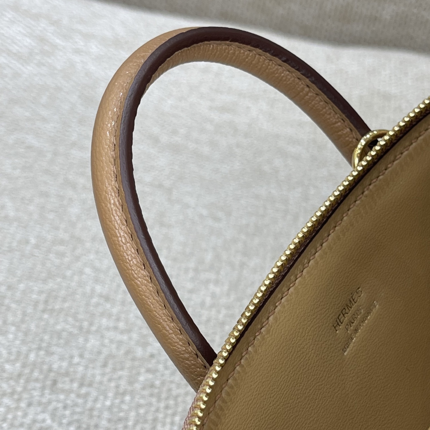 Hermès Model: Mini Bolide Color: Hazel Wood, Gold Dimensions: 18cm x 7cm x 20cm (including handle)