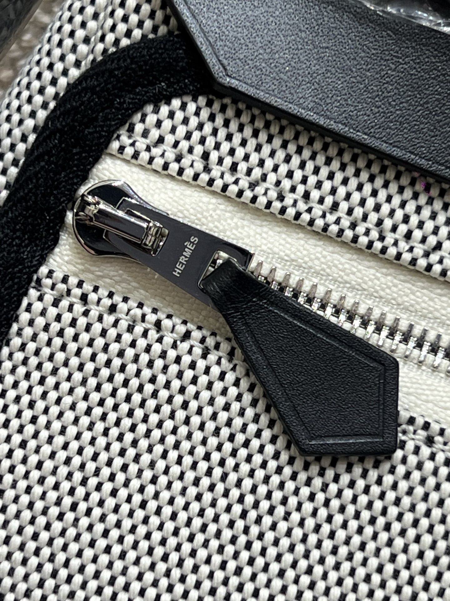 Hermès Model: Mini Herbag Color: Panda Black with Silver Hardware Dimensions: 20*17*7cm