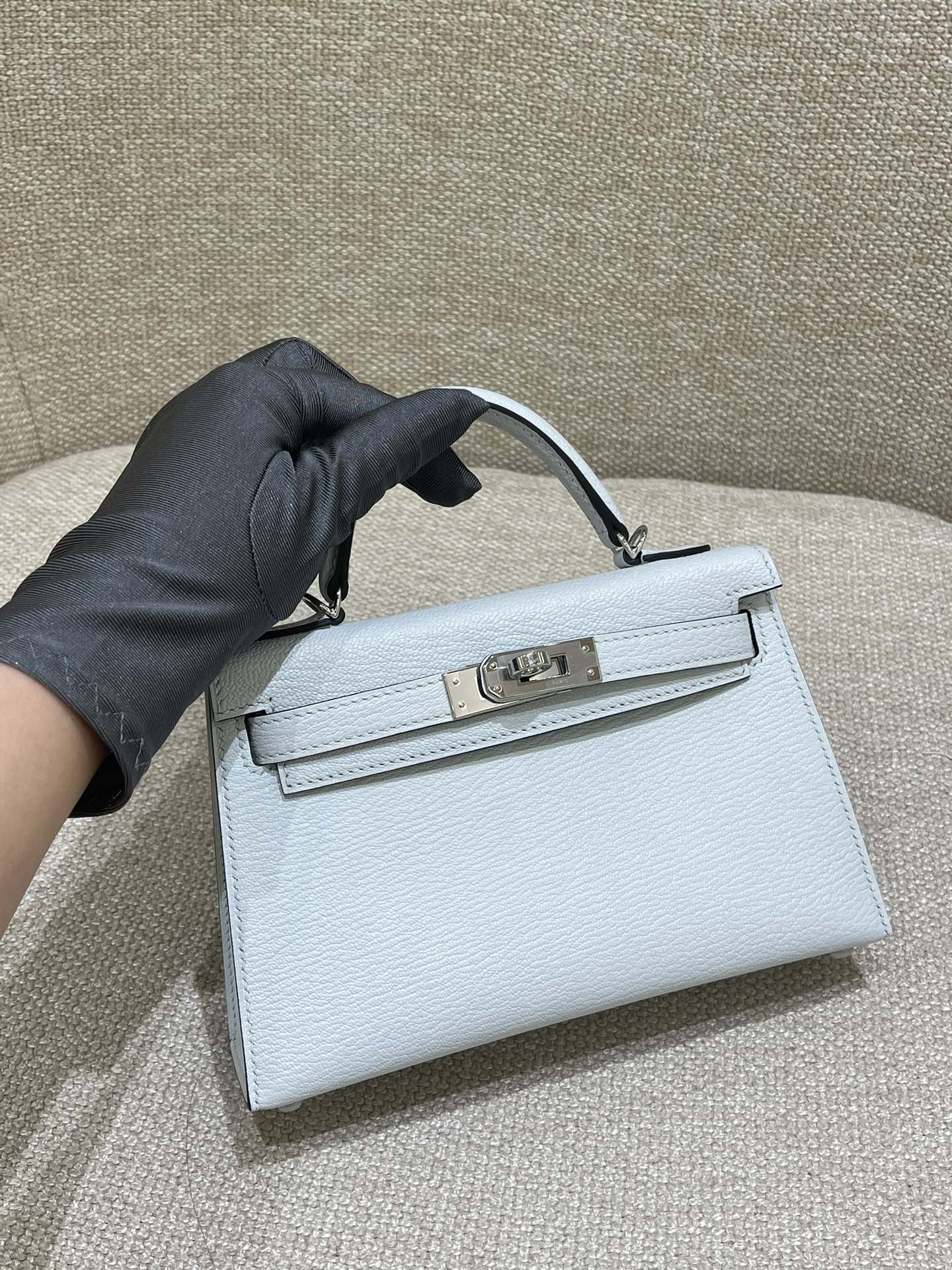 Hermès Model: Kelly Mini 2nd Generation Color: Smoky Blue with Silver Hardware Dimensions: 19cm x 12cm x 5.5cm