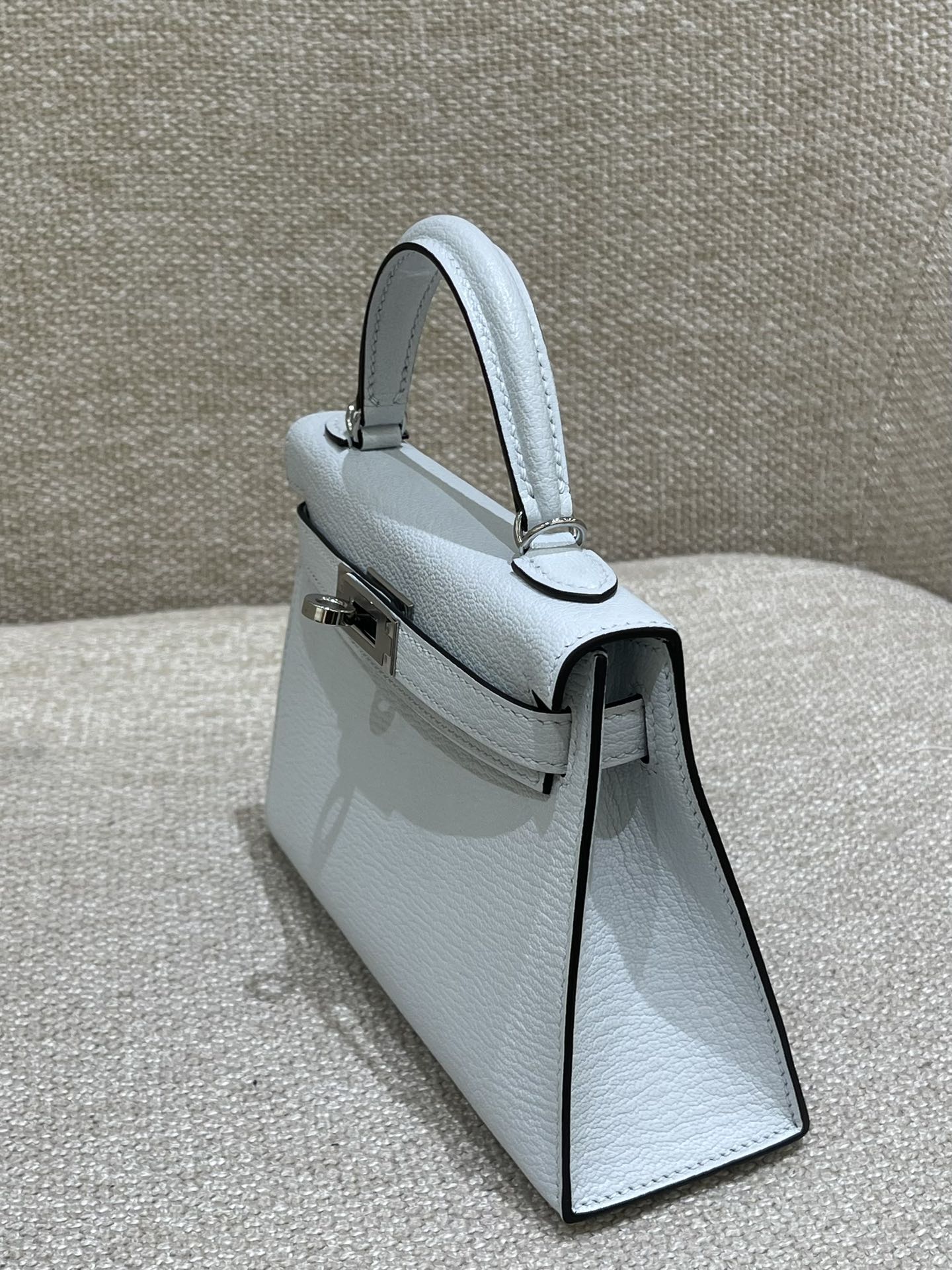 Hermès Model: Kelly Mini 2nd Generation Color: Smoky Blue with Silver Hardware Dimensions: 19cm x 12cm x 5.5cm
